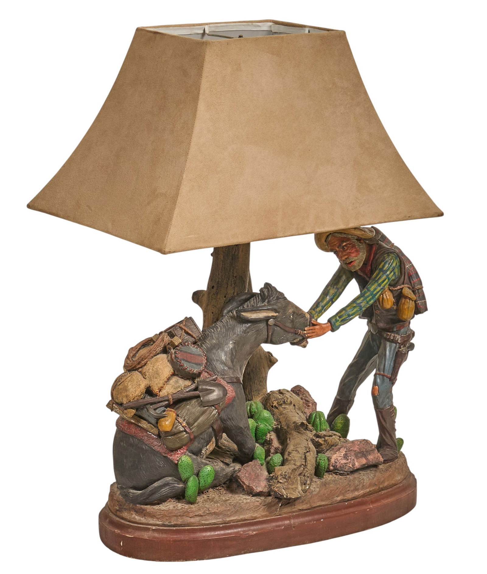 Apsit Bros. Gold Miner & Mule Lamp: Apsit Bros. of California cast and painted plaster figural lamp depicting a gold miner with his mule, marked near baseheight 28 in. x width 22 in. x depth 14 in. Provenance: Property from a