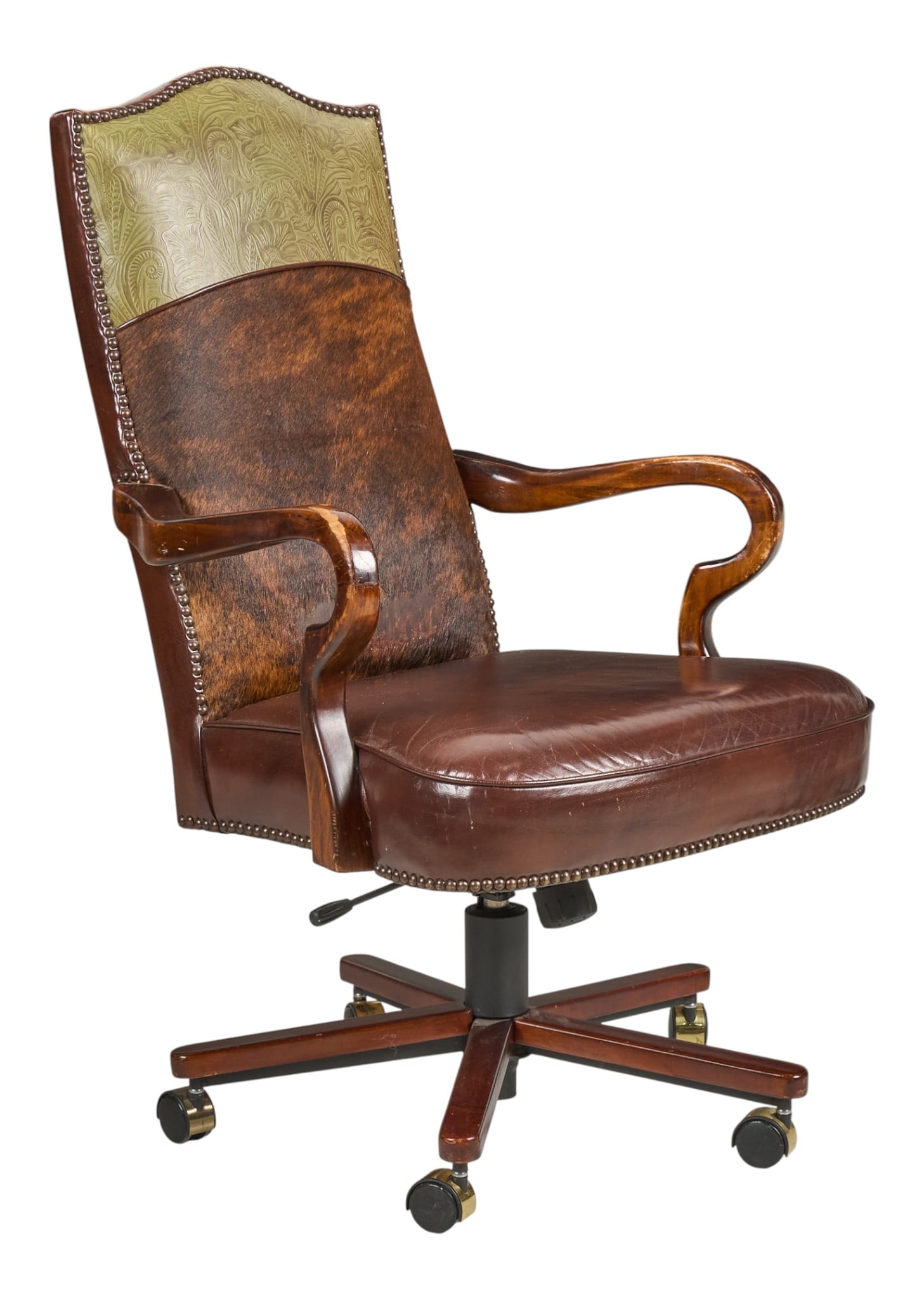 Ranch Style Office Chair: Ranch style office chair with hair on hide and embossed leather upholstery, supported on rolling swivel baseProvenance: Property from a home in San Antonio, Texas