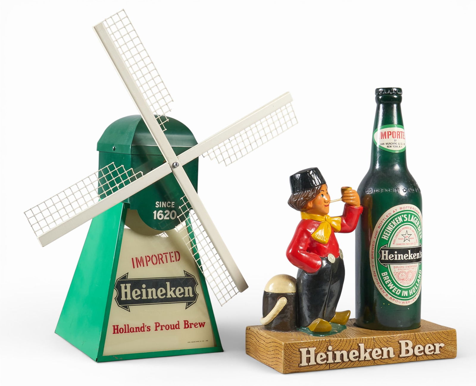 Vintage Heineken Beer Motion Windmill Display, 1960s: Vintage Heineken Beer advertising display featuring a motion windmill and a statue with a Heineken Beer bottle, circa 1960sheight 25 in. x width 11 in. x depth 22 in. / largest Provenance:
