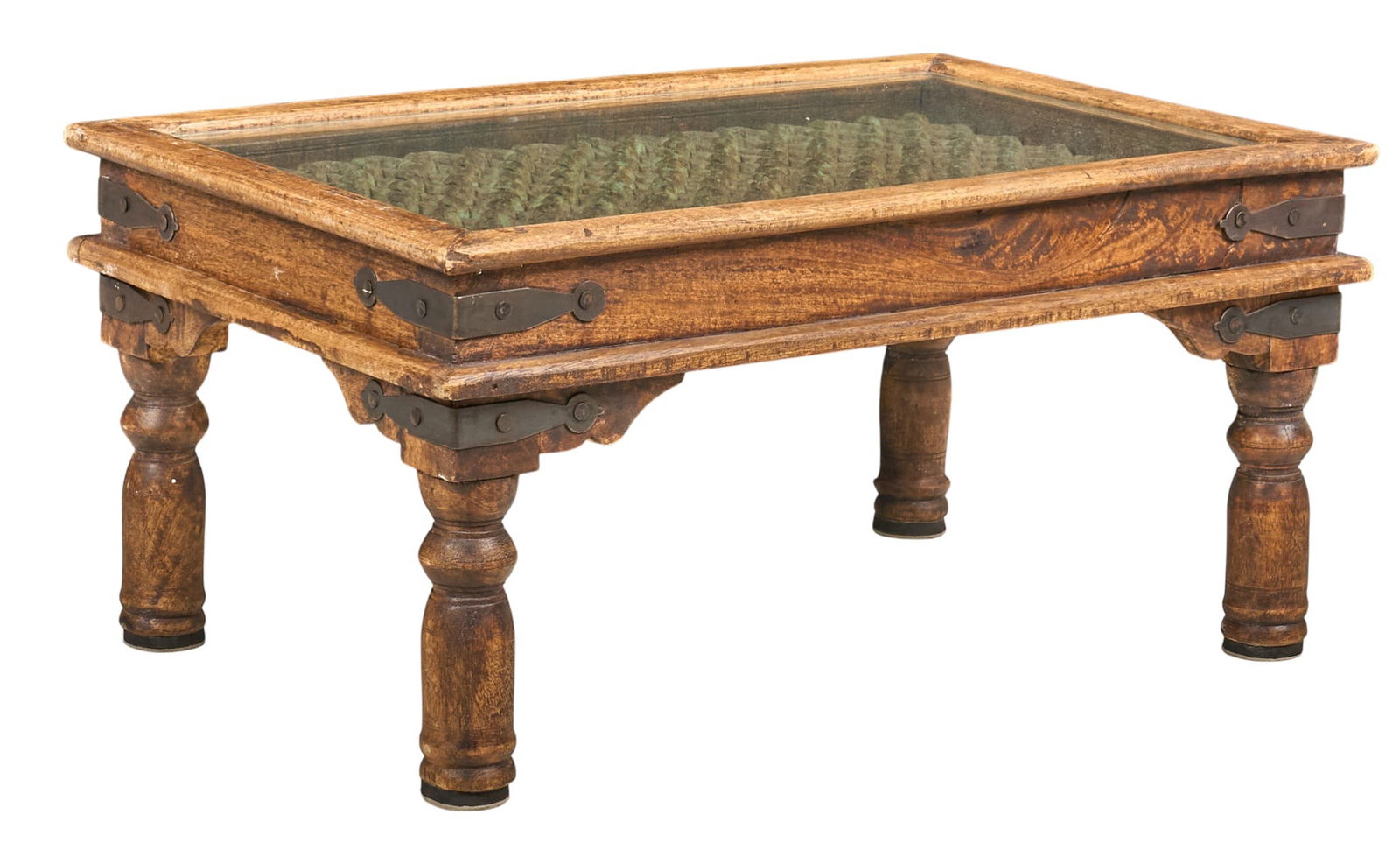 Rustic Coffee Table: Rustic coffee table with glass top above iron links with patina, featuring iron hardware and thick turned legsheight 17 in. x width 23 in. x depth 34 in.Provenance: Property from a home in San