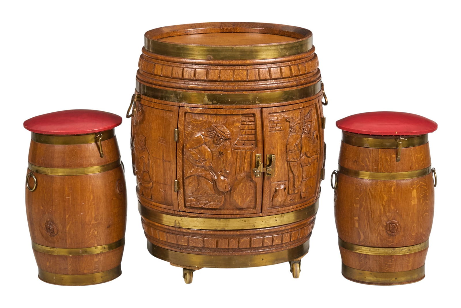 Carved Wooden Barrel Bar Cabinet with (2) Stools: Carved wooden barrel-form bar cabinet with carved figural scenes, brass banding, and a hinged door revealing a green felt lined interior with glass holders, with two matching stoolsheight 27 in. x