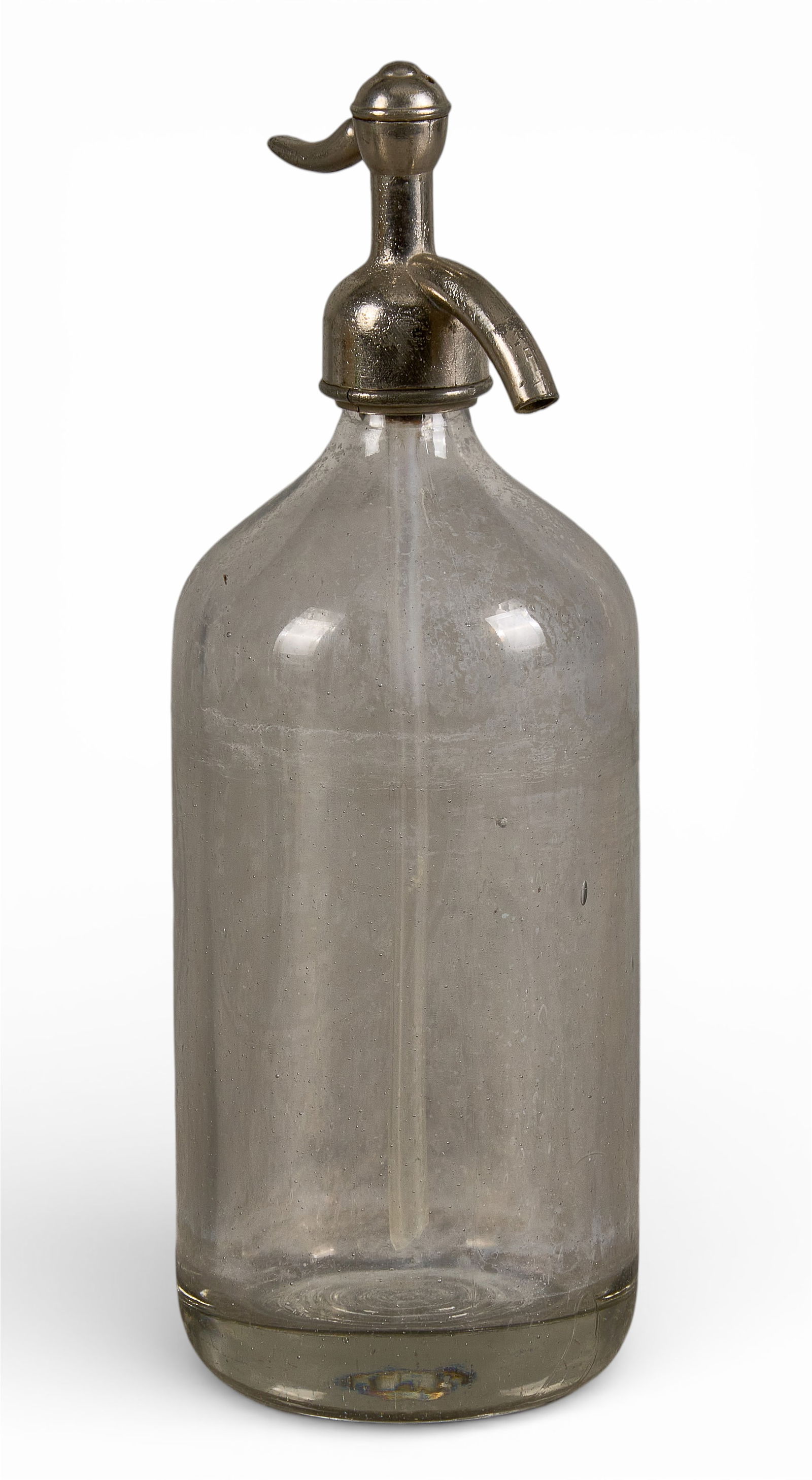 Naegelin's Soda Fountain Bottle, New Braunfels, TX: Clear glass soda fountain bottle marked Ed. Naegelin, New Braunfels, TX height 12 in. x width 4 in. x depth 4 in. Provenance: Property from a home in San Antonio, Texas