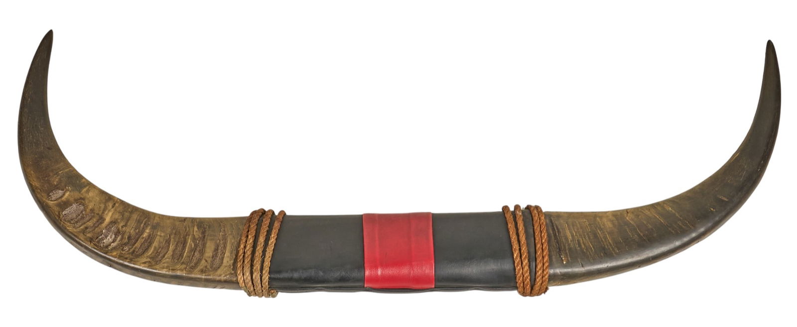 Horn Mount: Pair of horns, with leather and twisted rope accents height 13.5 in. x width 41 in. x depth 3.5 in. Provenance: Property from a home in San Antonio, Texas