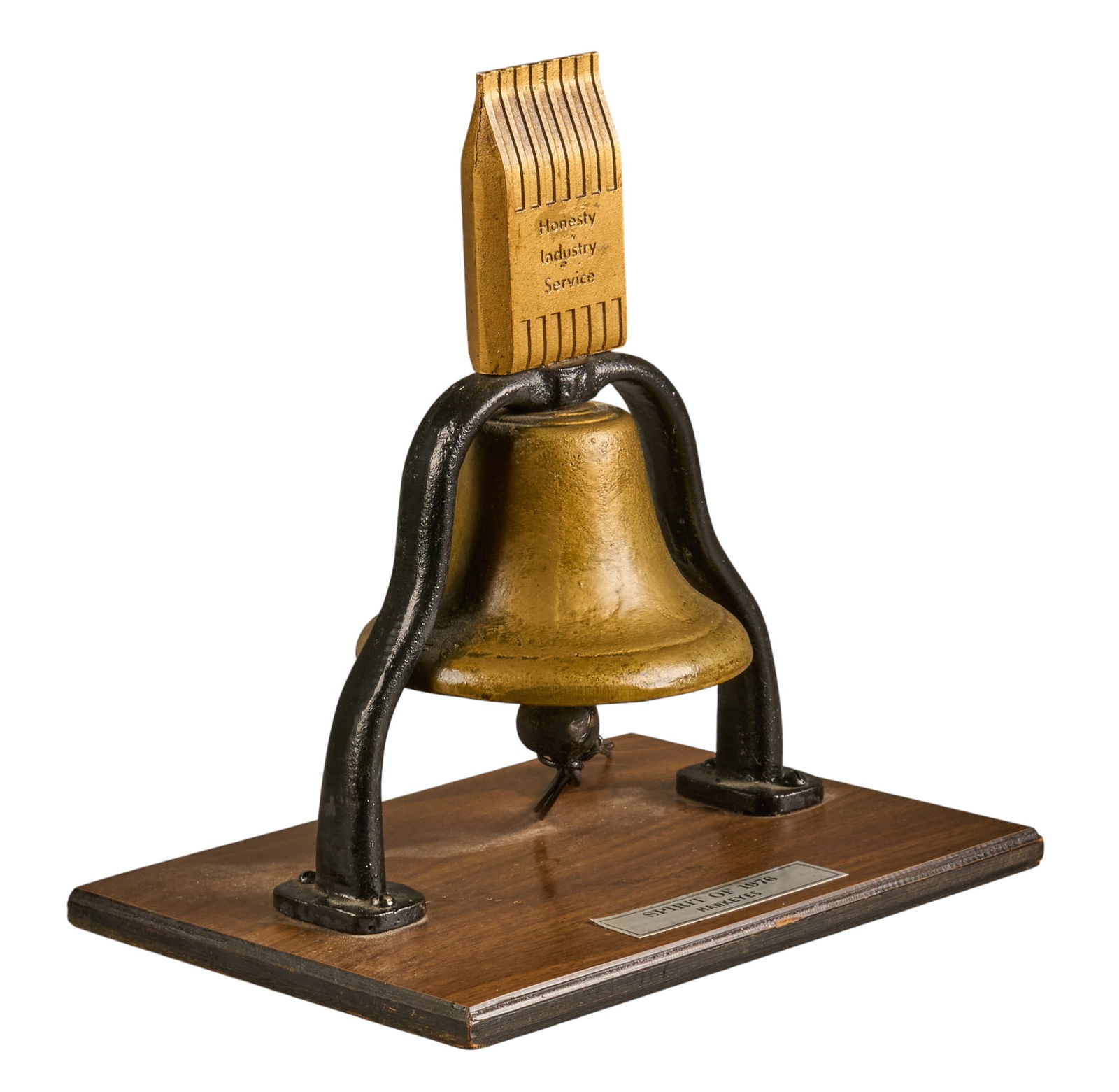 MoorMan's 1976 Bell: Commemorative table-top brass bell in iron stand on wooden base for MoorMan's farmer feed, with label that reads "Spirit of 1976" height 12 in. x width 11 in. x depth 8.5