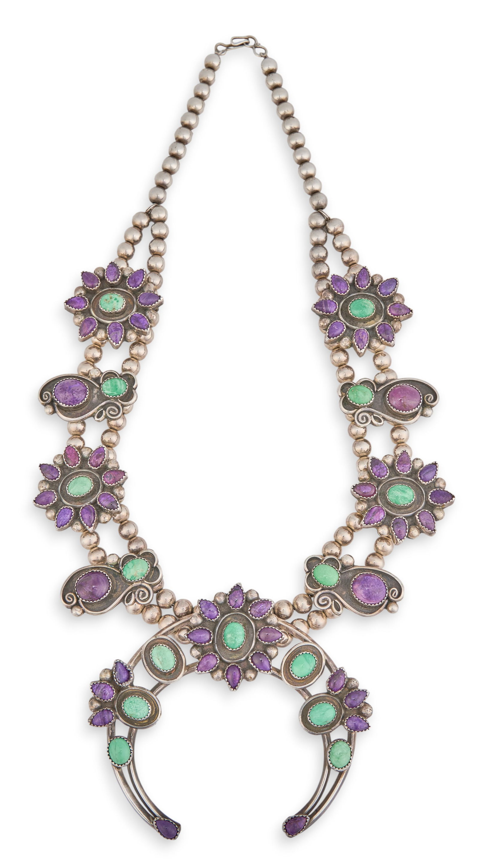 Turquoise & Charoite Necklace: Sterling silver beaded necklace set with turquoise and charoite cabochons, in floral motifs, with hook and eye closureLength: 20.5 in. Total weight: 6.12 oztProvenance: Property from the collection