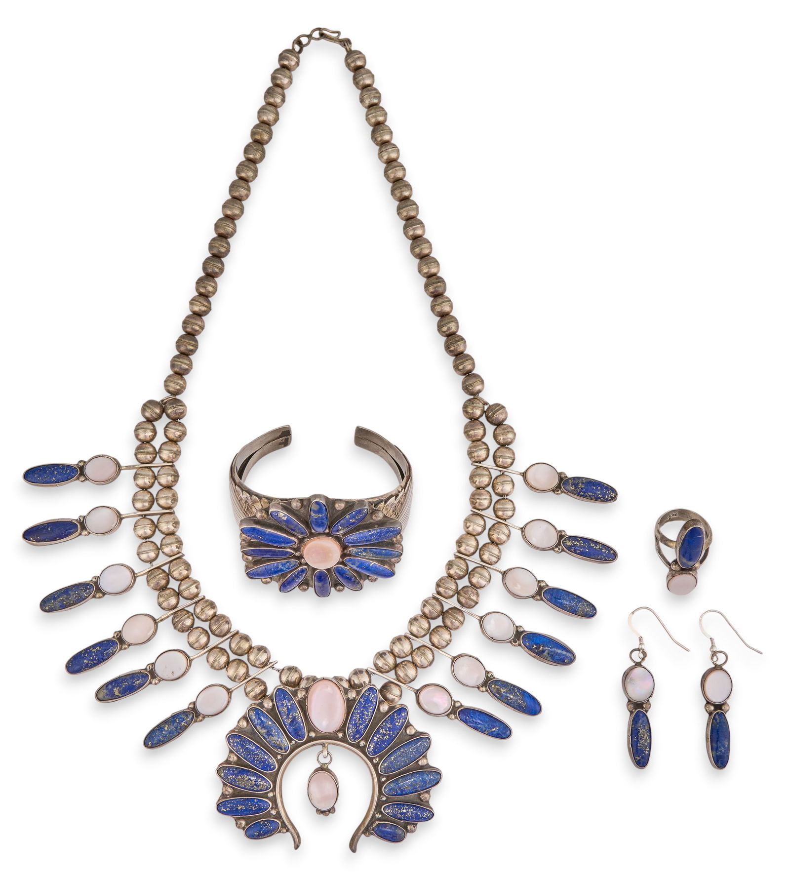 Sterling Silver Lapis & Mother of Pearl Suite: Sterling silver jewelry suite to include a necklace, cuff bracelet, pair of earrings, and ring, each with inlaid lapis lazuli and mother of pearl details throughout, marked "J" and &quo