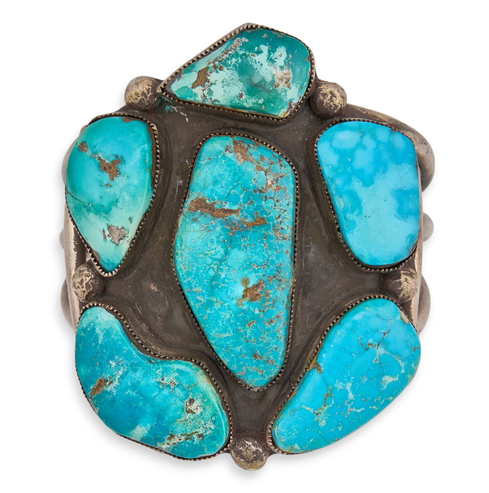 Substantial Sterling & Turquoise Cuff: Substantial sterling silver cuff bracelet set with large turquoise stones Circumference: 7 in. / largestTotal weight: 4.255 ozt Provenance: Property from a home in San Antonio, Texas