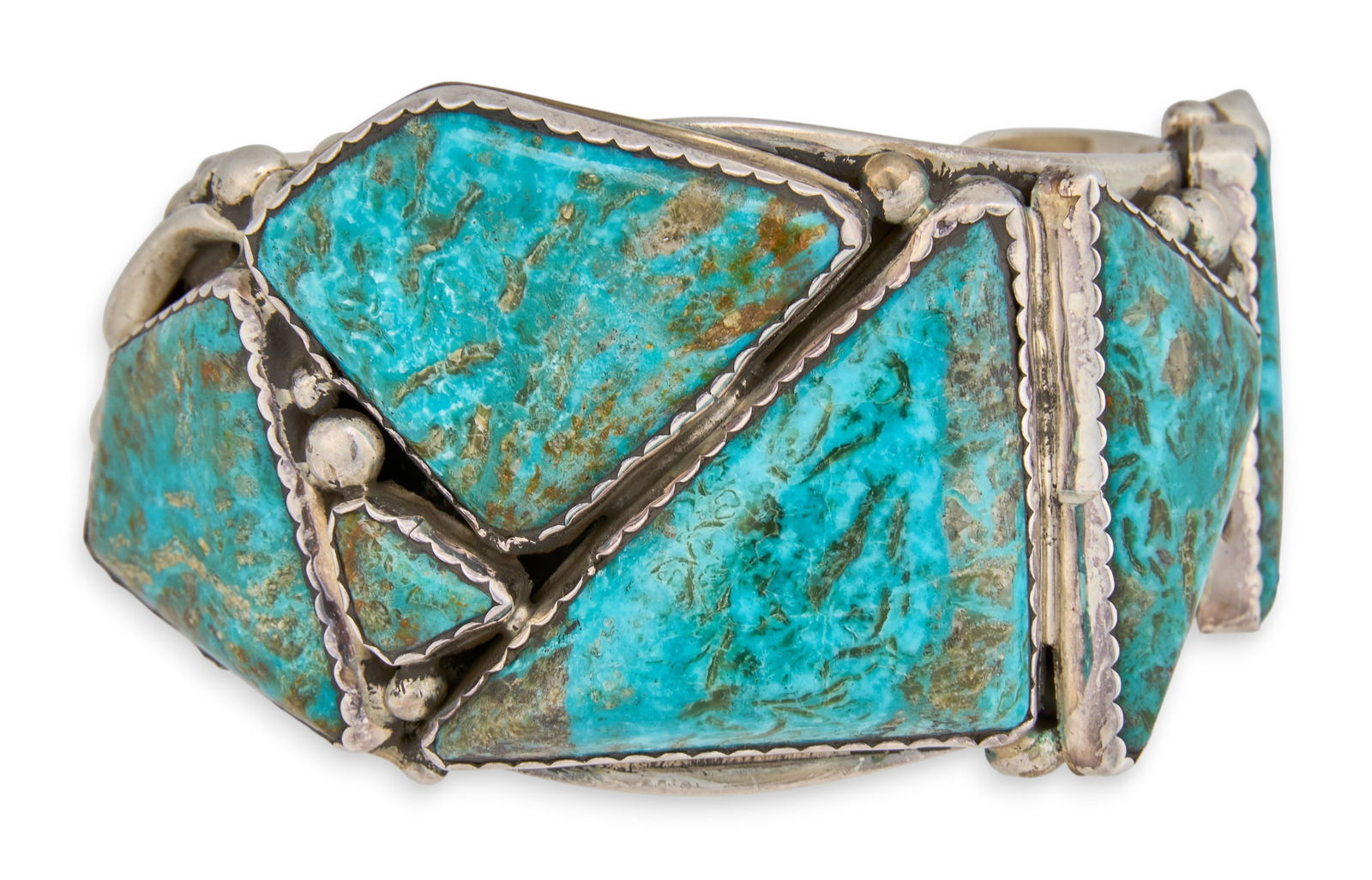 Modernist Sterling & Turquoise Cuff: Modernist sterling silver cuff bracelet, set with abstract-cut turquoise stones, marked "R" and "Sterling"Circumference: 6.75 in. Total weight: 3.67 oztProvenance: Property from a