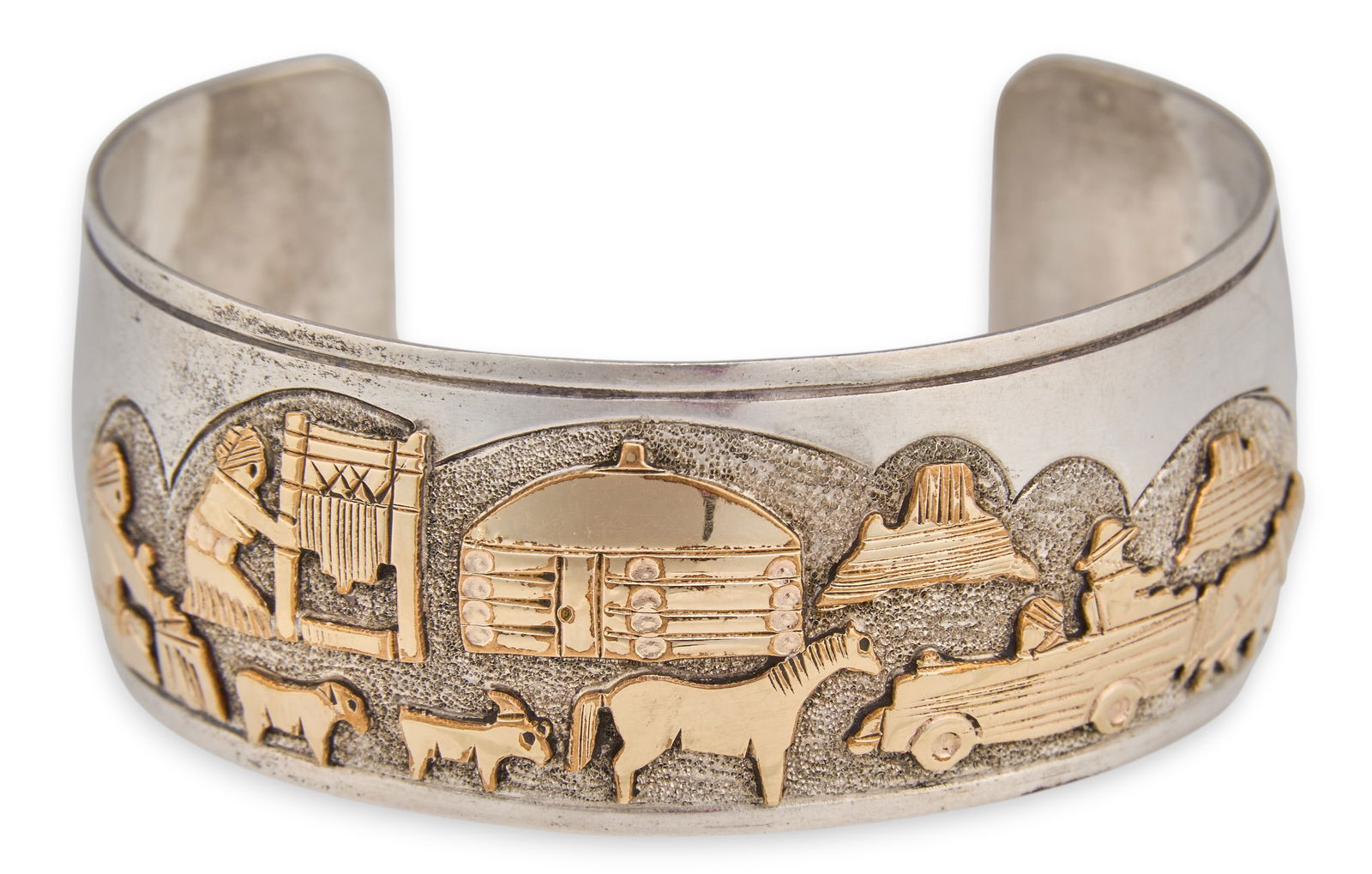 Jacob Kahe, Sterling Silver Storyteller Cuff: Jacob Kahe, Navajo two-toned sterling silver storyteller cuff bracelet, depicting figural scenes in a landscape, marked "JK Sterling"Circumference: 7.25 in. Total weight: 1.425