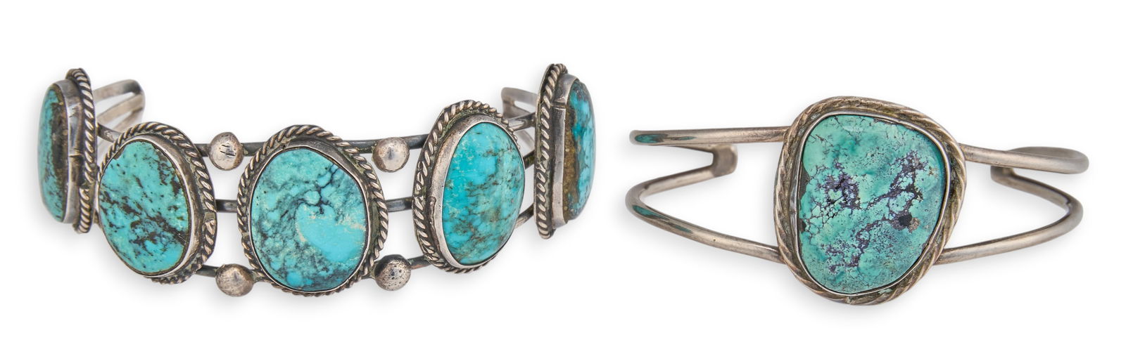 (2) Turquoise Cuff Bracelets: Two sterling silver cuff bracelets, each set with turquoise stones and twisted rope motifs Length: 6.75 in. / largestTotal weight: 1.265 ozt Provenance: Property from the personal collection of a