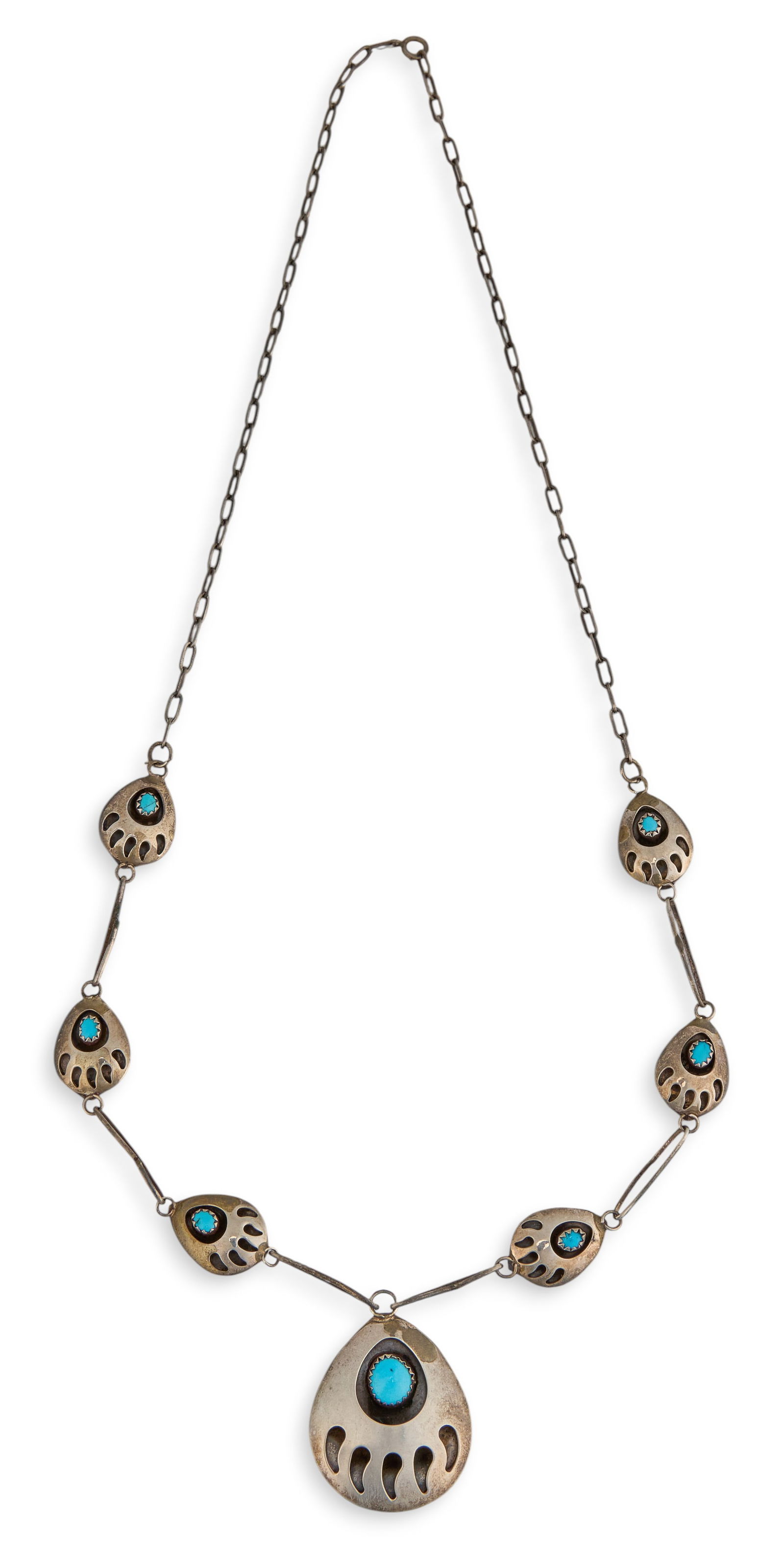 Turquoise Bear Claw Shadowbox Necklace: Sterling silver necklace with shadowbox design featuring bear claw motifs, and set with turquoise cabochons, clasp marked "925"Length: 22in. Total weight: 0.41