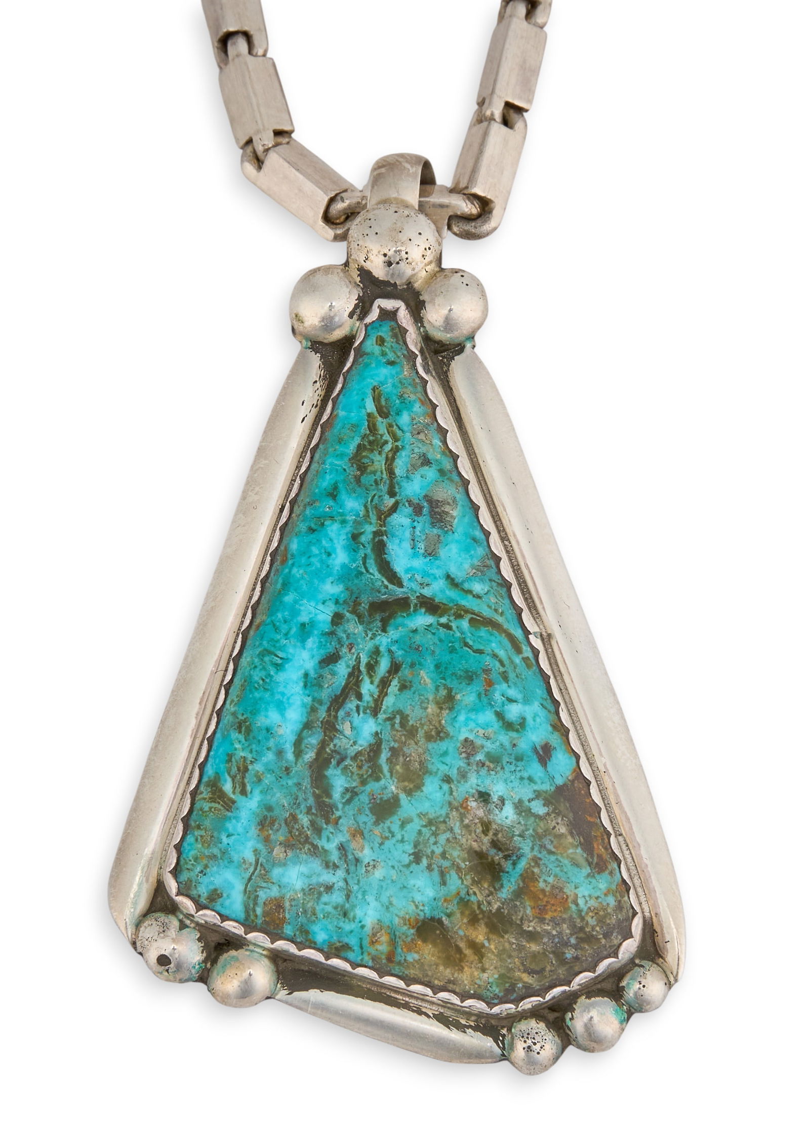 Modernist Sterling & Turquoise Pendant Necklace: Modernist sterling silver pendant necklace, pendant set with turquoise stone, marked "R" and "Sterling" Length: 26 in.Total weight: 3.155 ozt Provenance: Property from a