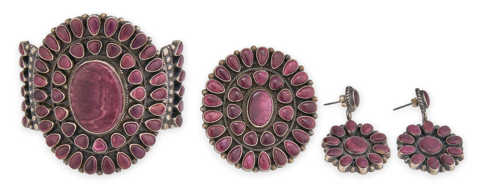 Anthony Skeets, Sterling & Spiny Oyster Jewelry Suite: Anthony Skeets, Navajo sterling silver jewelry suite to include a cuff, ring, and pair of earrings, set with spiny oyster cabochons in cluster design, each marked "AS Sterling" Ring siz