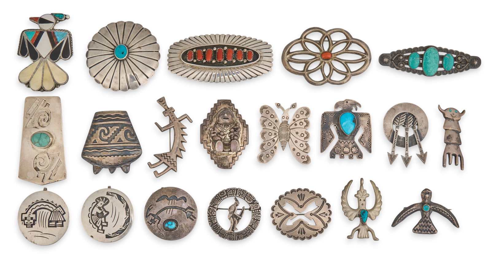 (20) Southwestern Pins and Pendants: Collection of twenty Southwestern and Native American sterling silver pins and pendants, in various sizes and styles, featuring multi-stone inlay and settings, several signedSize: 3 in. x 1.5 in. /