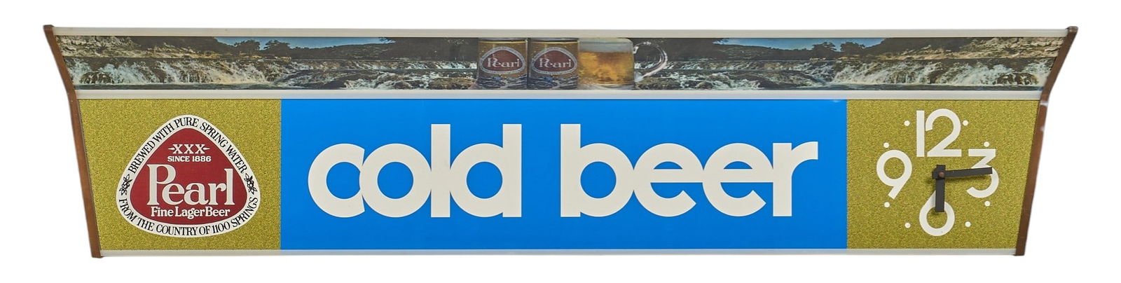 Pearl Cold Beer Lighted Clock, 1974: Vintage Pearl Beer lighted clock with "Cold Beer" text and Pearl Beer logo, circa 1974height 11 in. x width 54 in. x depth 9 in. Provenance: Property from a home in Seguin, Texas