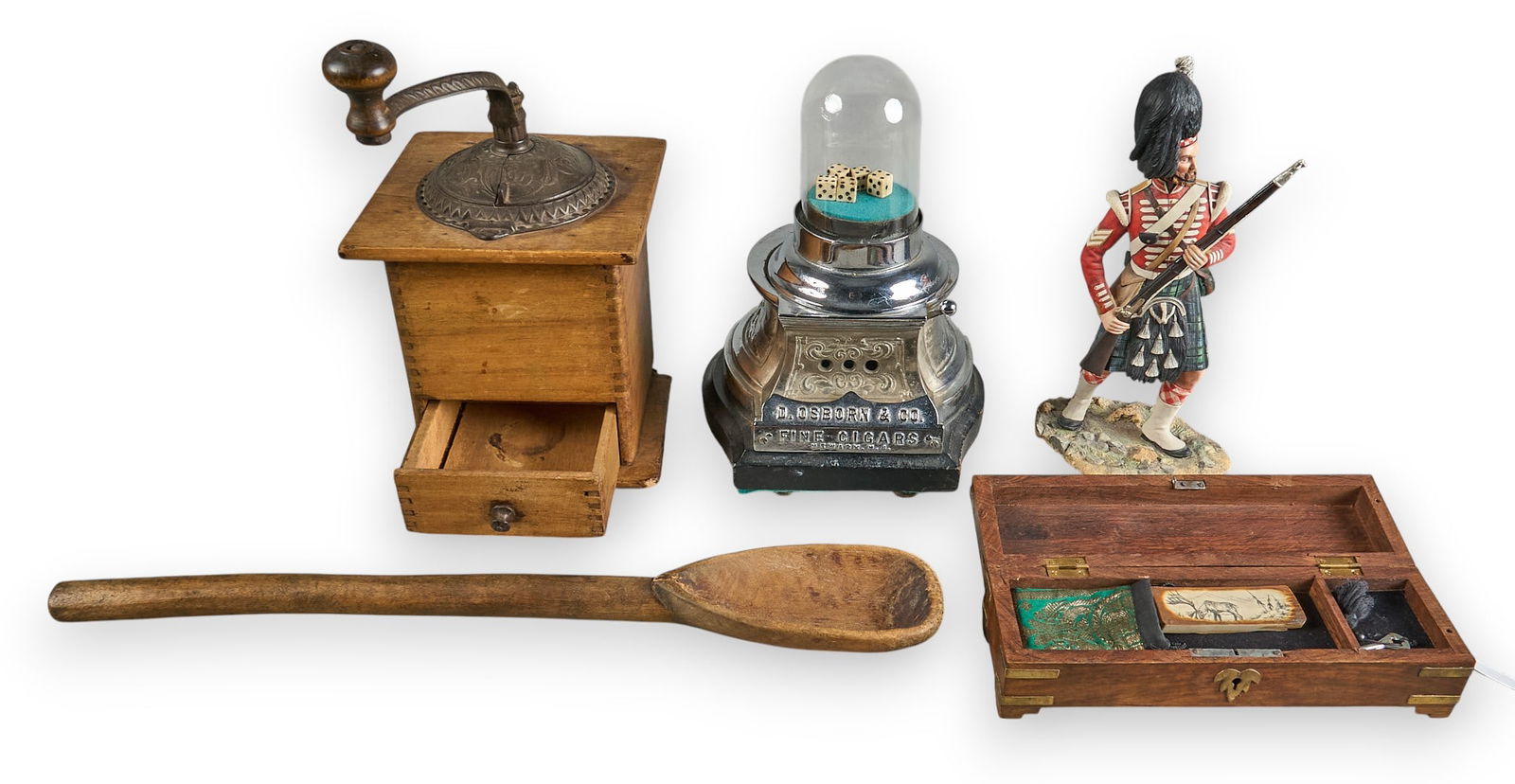 Rustic Decor: Collection of small antique rustic items to include a coffee grinder, dice popper, highlander bronze, and a pen boxheight 12.5 in. x width 7 in. x depth 10 in.Provenance: Property from