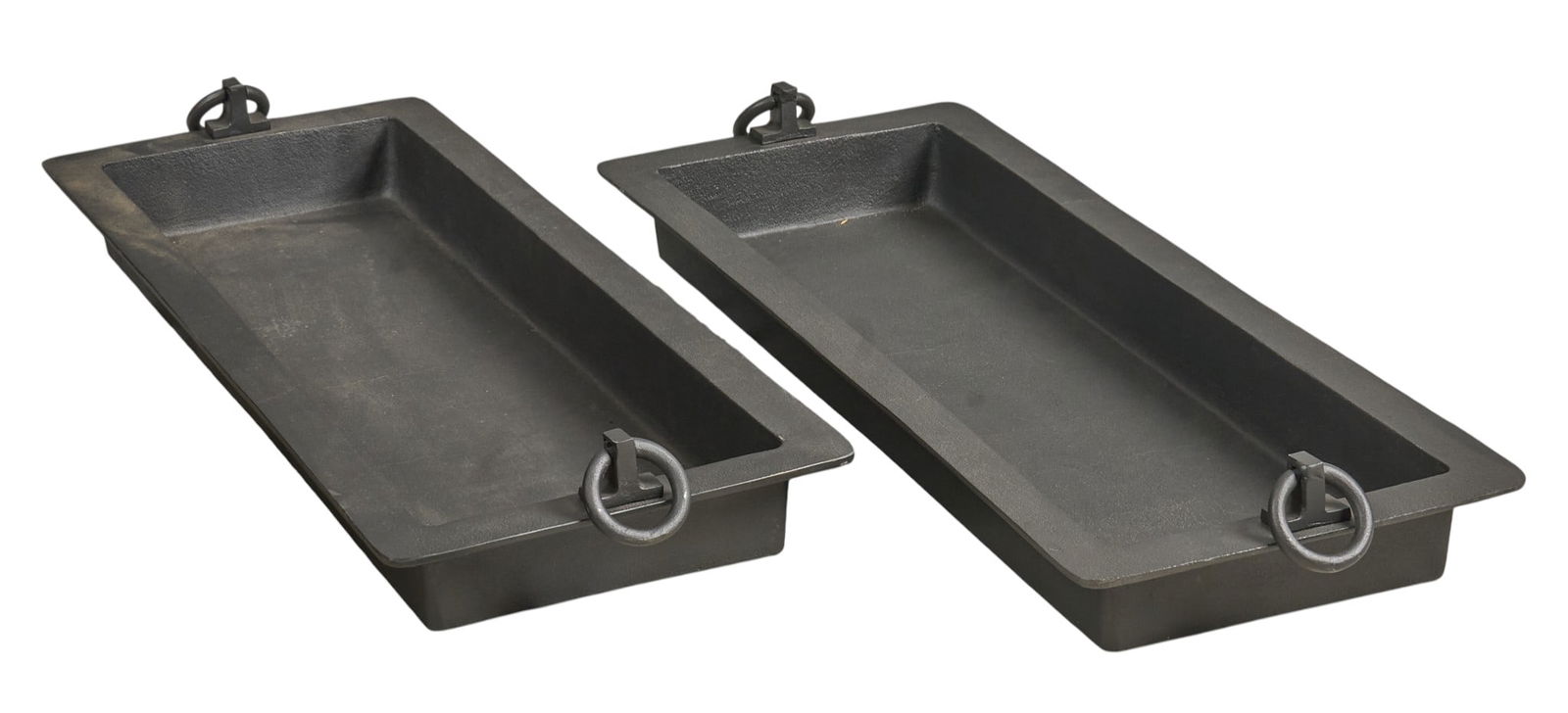 Pair of Cast Iron Troughs: Pair of cast iron toughs with ring handlesheight 5.5 in. x width 38 in. x depth 14 in. Provenance: Property from a home in San Antonio, Texas