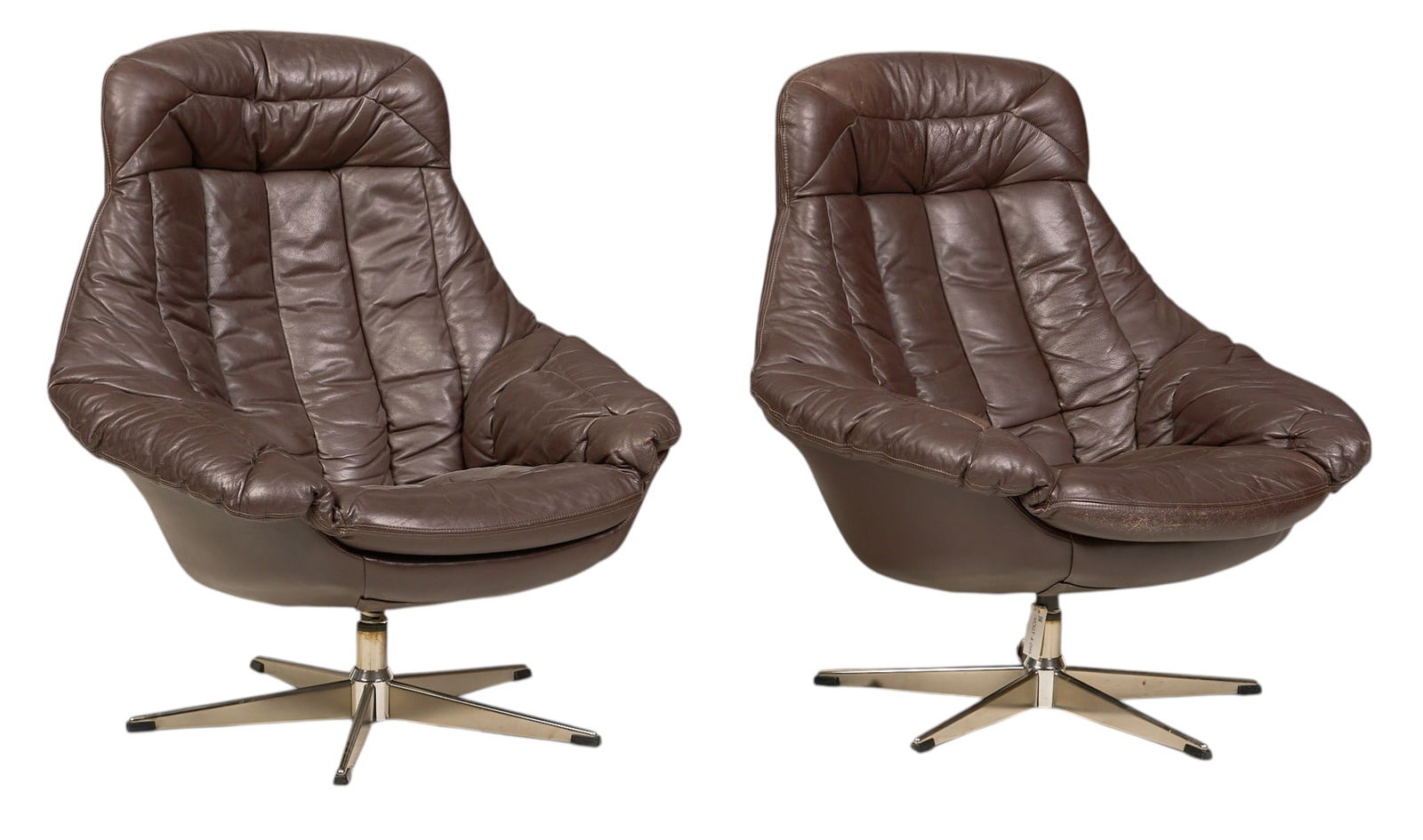 Pair of H.W Klein for Bramin "Silhouette" Chairs: Pair of H.W. Klein (Denmark) for Bramin (Denmark) "Silhouette" armchairs with molded backs, and brown leather upholstery, supported on chrome swivel baseheight 38 in. x width 33 in. x depth