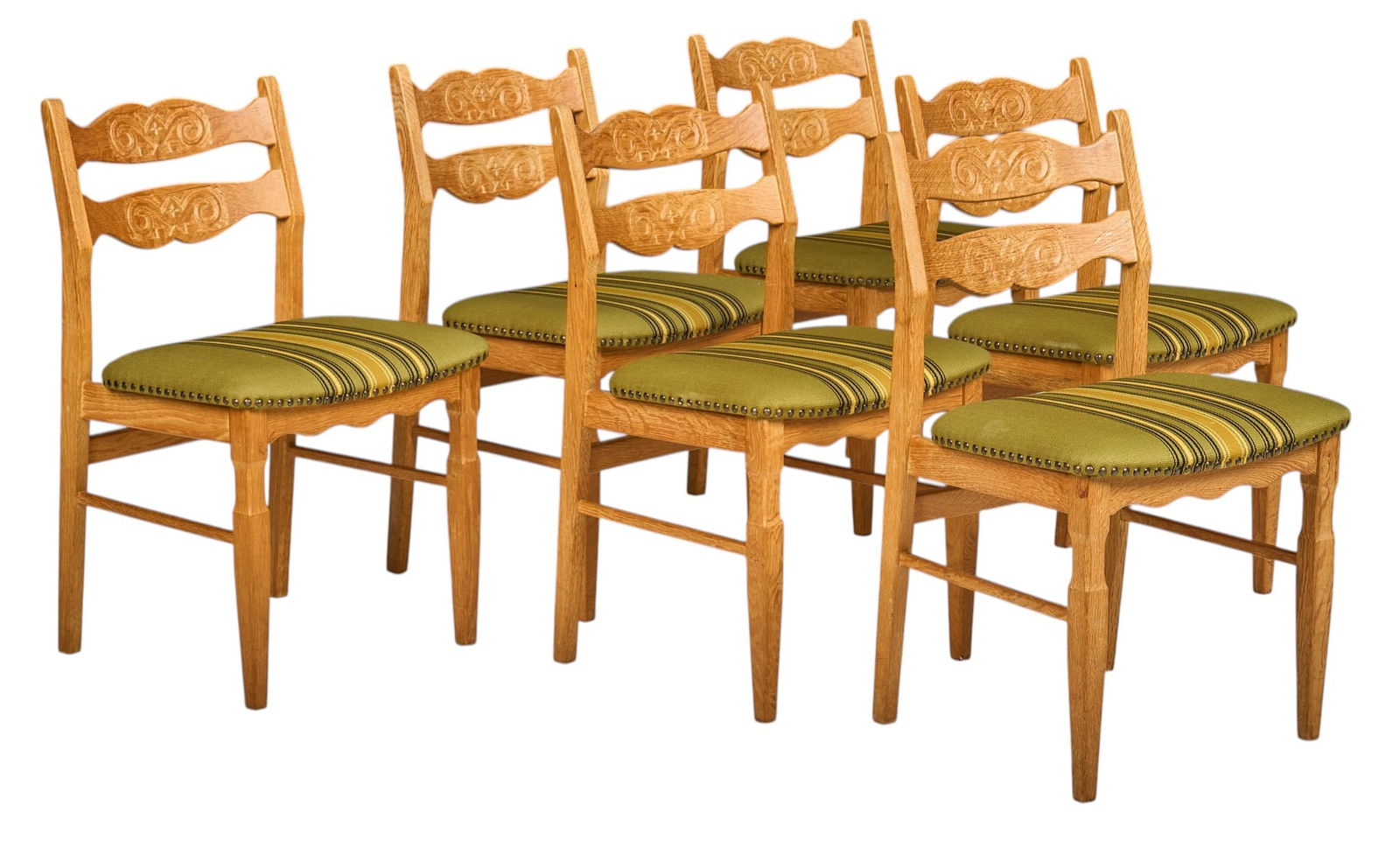 Set of (6) Henning Kjaernulf "Razorblade" Mid-Century Oak Dining Chairs: Set of six Henning Kaernulf (Denmark) "Razorblade" mid-century oak dining chairs, with carved ladder back, green striped upholstered cushions, supported on pin legs heigh