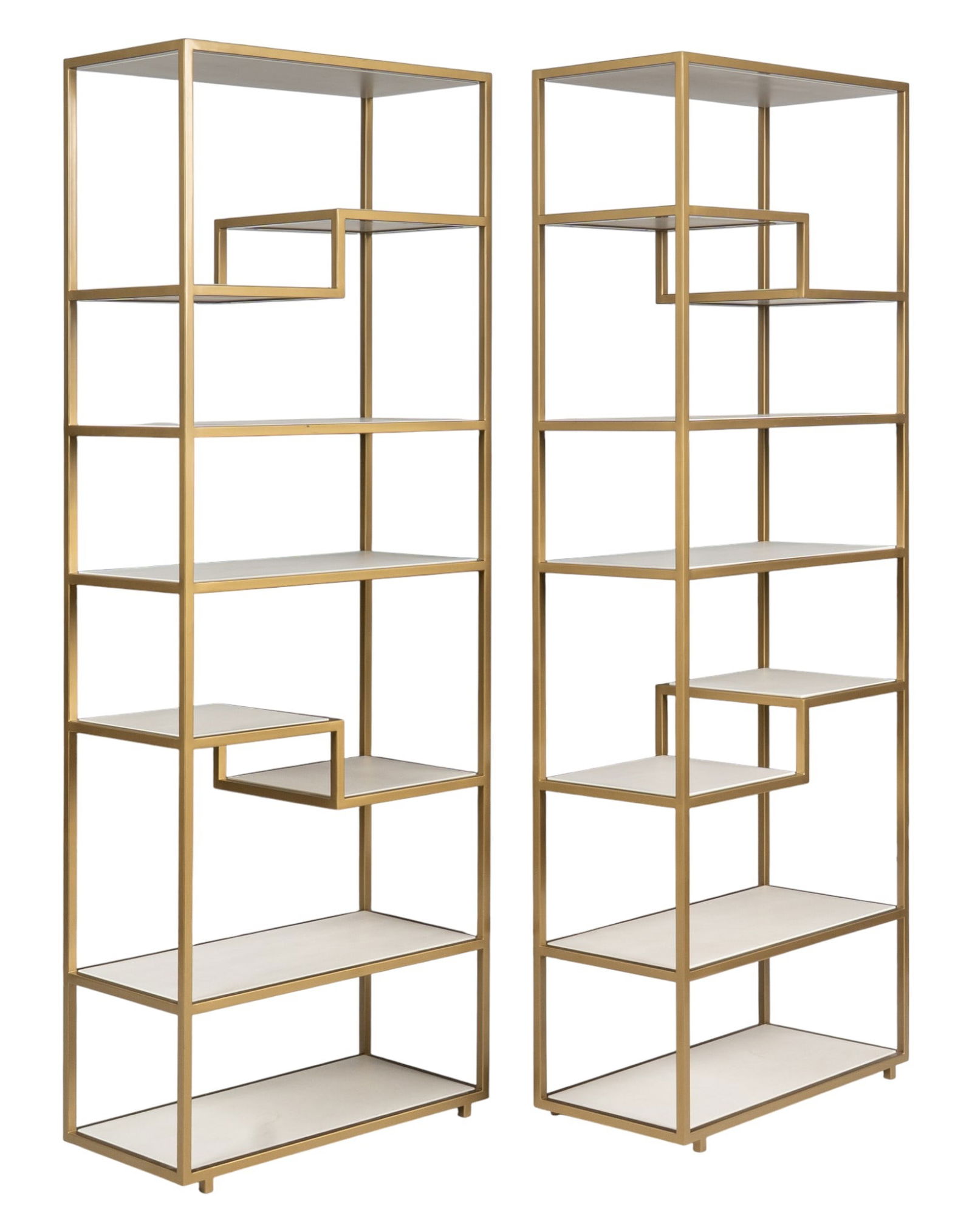 Pair of Geometric Etageres: Pair of geometric etageres with staggered shelving and gold tone metal frames height 86 in. x width 30 in. x depth 15 in. Provenance: Property from the Dominion home of a prominent San Anto