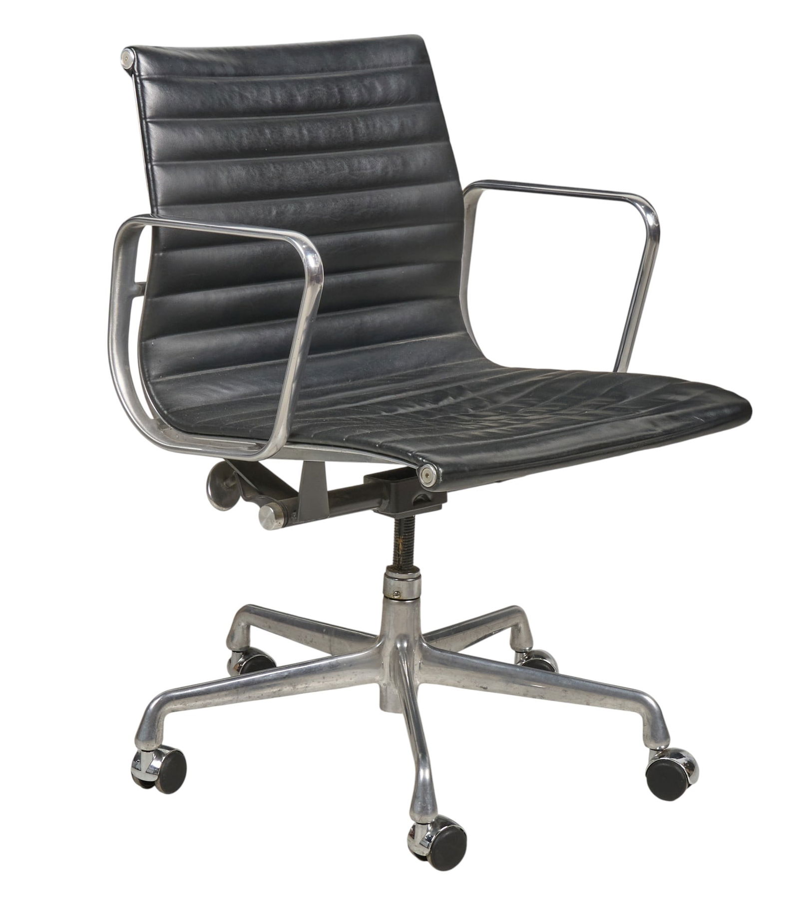 Eames Aluminum Group Management Chair: Eames Aluminum Group Management Chair, designed by Charles and Ray Eames for Herman Miller, with polished aluminum finish to base, ribbed black leather seat and back, on double wheel casters, marked w