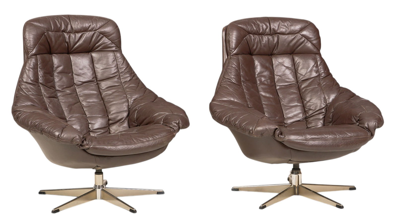 Pair of H.W. Klein for Bramin "Silhouette" Chairs: Pair of H.W. Klein (Denmark) for Bramin (Denmark) "Silhouette" armchairs with molded backs, and brown leather upholstery, supported on chrome swivel baseheight 38 in. x width 33 in. x depth