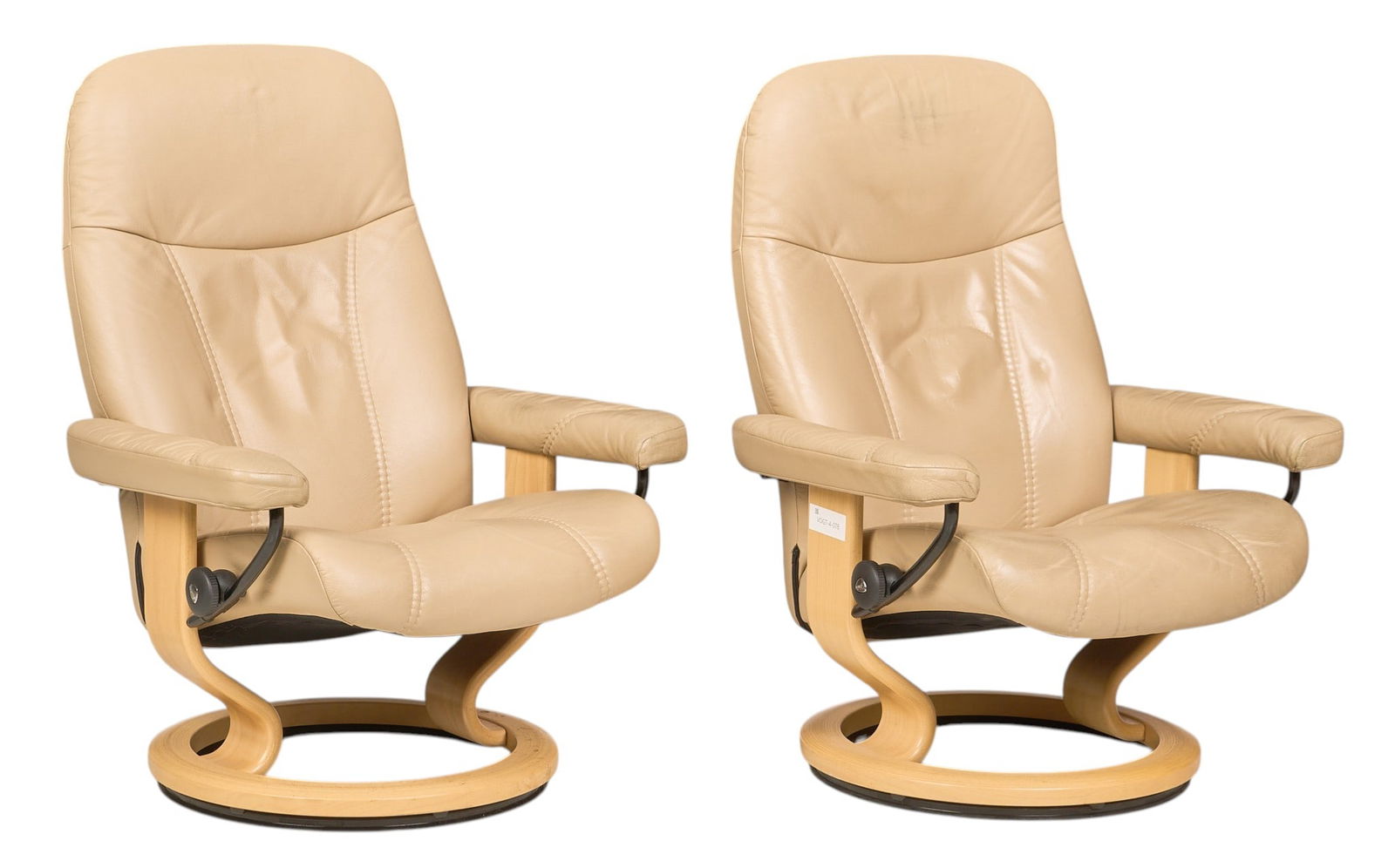 Pair of Ekornes Stressless Consul Recliners: Pair of Stressless Consul (Norway) reclining lounge chairs with light beige leather seats, padded armrests, and bentwood baseheight 39 in. x width 30 in. x depth 28 in. / each 