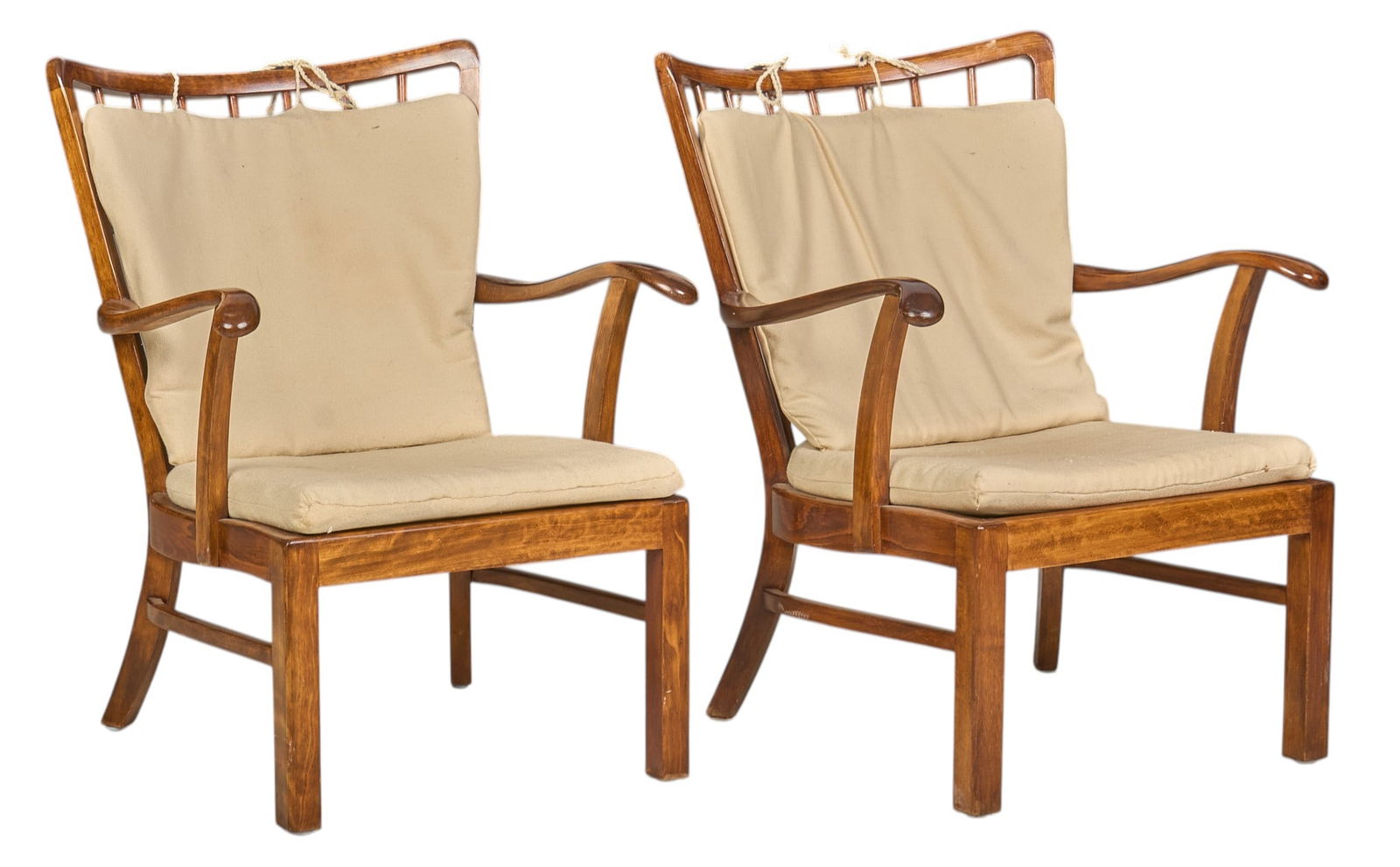 After Fritz Hansen, Pair of Armchairs: After Soren Hansen's Model 1628 Armchair for Fritz Hansen, pair of armchairs with removable beige upholstered cushions, featuring slat backs and curved armrests, on stretchered block legs height 3