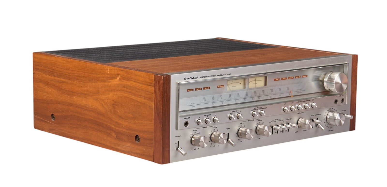 Pioneer SX-1050 Vintage Stereo Receiver: Vintage Pioneer stereo receiver, model SX-1050, featuring a wood case and silver face, in working condiitonheight 7 in. x width 21 in. x depth 18 in.Provenance: Property from a home in San Antonio,