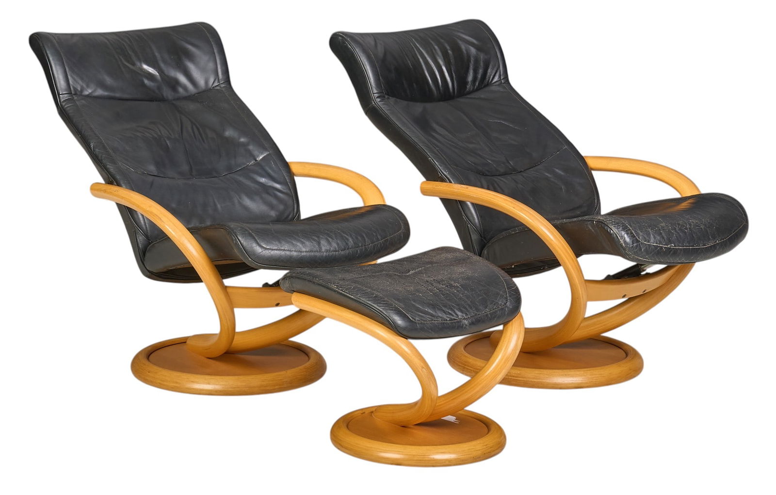 Danish Mid-Century Lounge Chair Set: Danish mid-century lounge chair set with pair of chairs with black leather upholstery, bentwood armrests, supported on swivel bases, and one matching ottoman height height 41 in. x width 29 in.