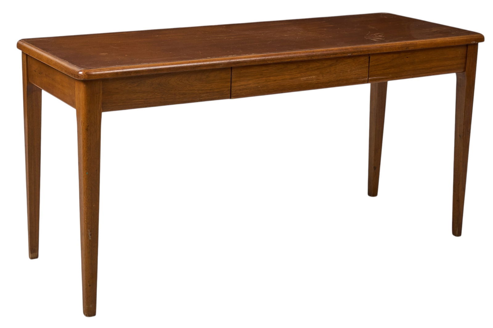 Mid-Century Table: Mid-century narrow table with single flush drawer, supported on pin legs height 29 in. x width 58 in. x depth 22 in. Provenance: Property from a home in San Antonio, Texas Condition: wear to tab