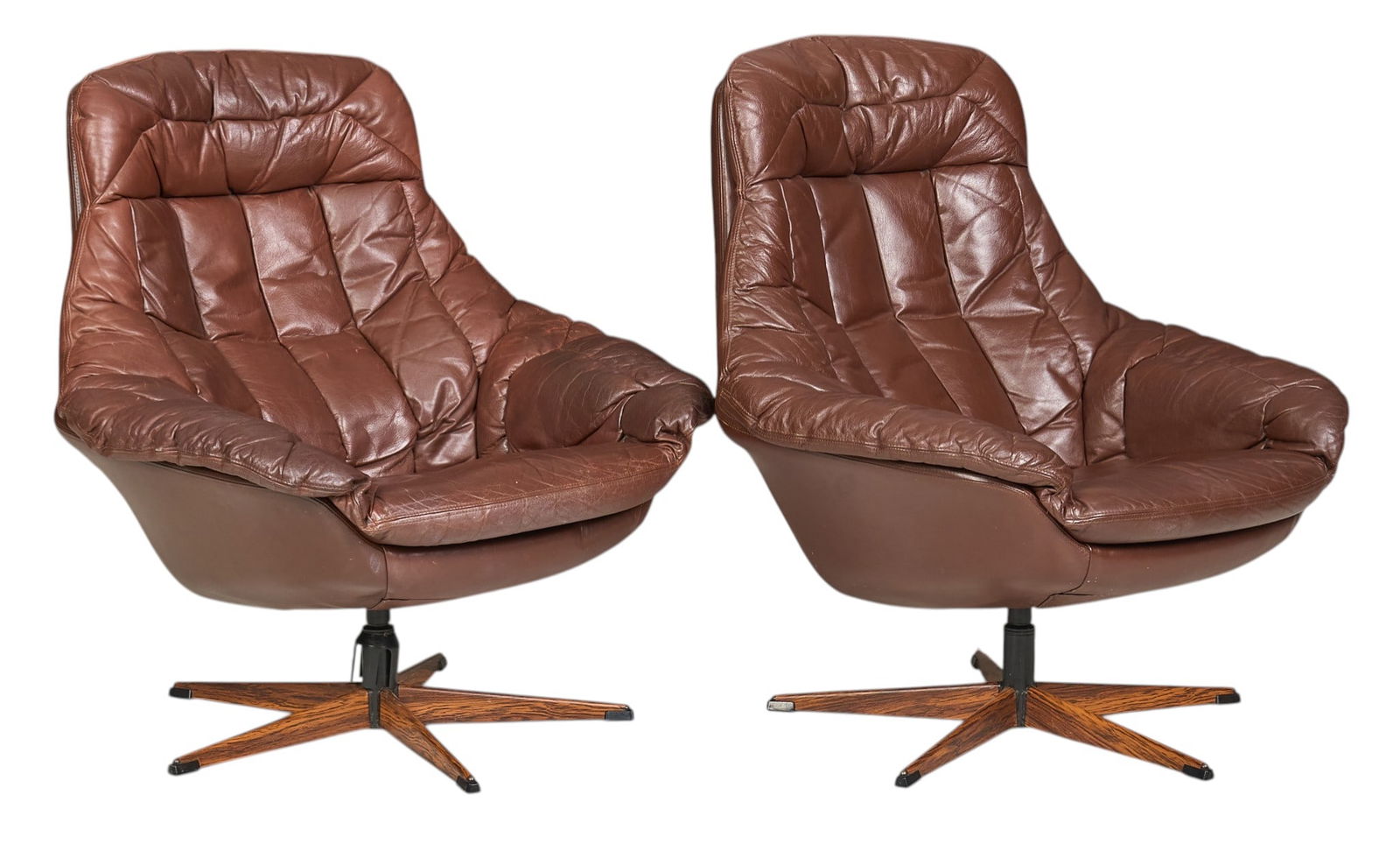 Attrib. to Henry Walter Klein, Pair of Mid-Century Lounge Chairs: Pair of Danish mid-century lounge chairs attributed to Henry Walter Klein (Norway) for Bramin Mobler (Denmark) in Silhouette model, with molded backs, brown leather cushions, and metal star base