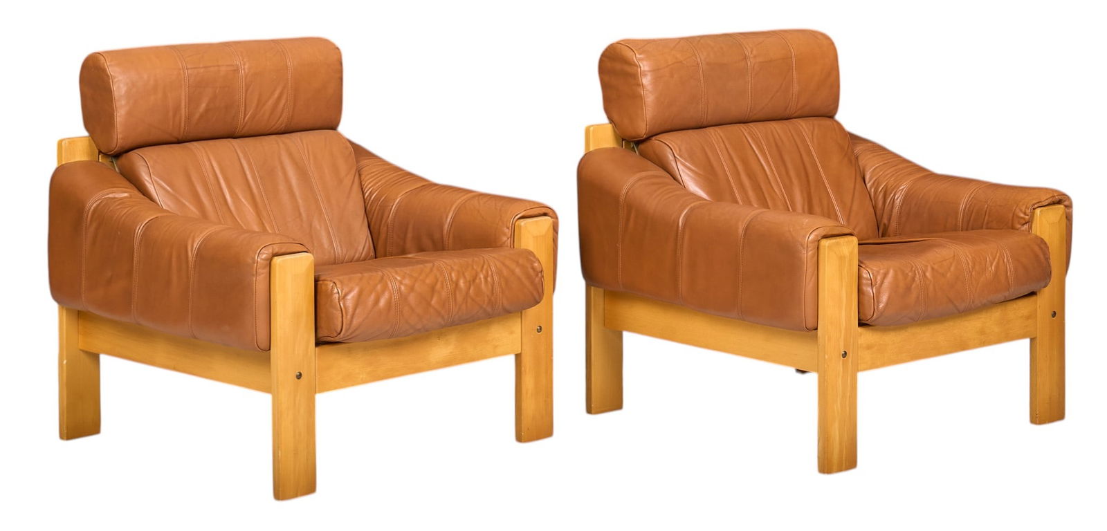 Pair of Danish Mid-Century Leather Lounge Chairs: Pair of mid-century leather armchairs with orange tufted leather upholstery and wooden block legsheight 32 in. x width 33 in. x depth 31 in. / each