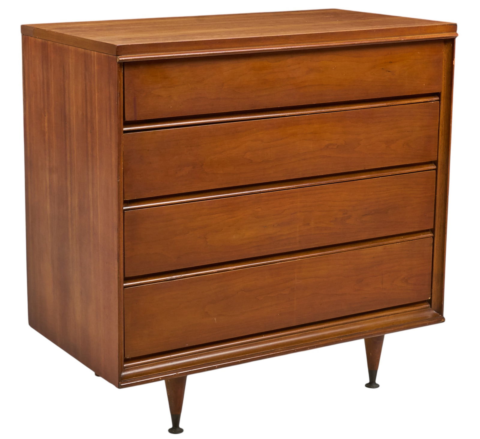 Mid-Century Chest of Drawers: Mid-century chest of drawers with four drawers featuring integrated handles, raised on tapered pin legsheight 32 in. x width 32 in. x depth 18 in.Provenance: Property from a home in San Antonio, Texas