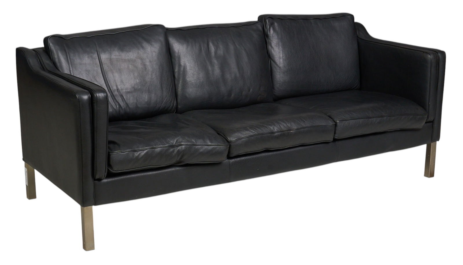 Danish Mid-Century Sofa: Danish mid-century black leather sofa, supported on steel legs height 26.5 in. x width 79 in. x depth 32.5 in. 