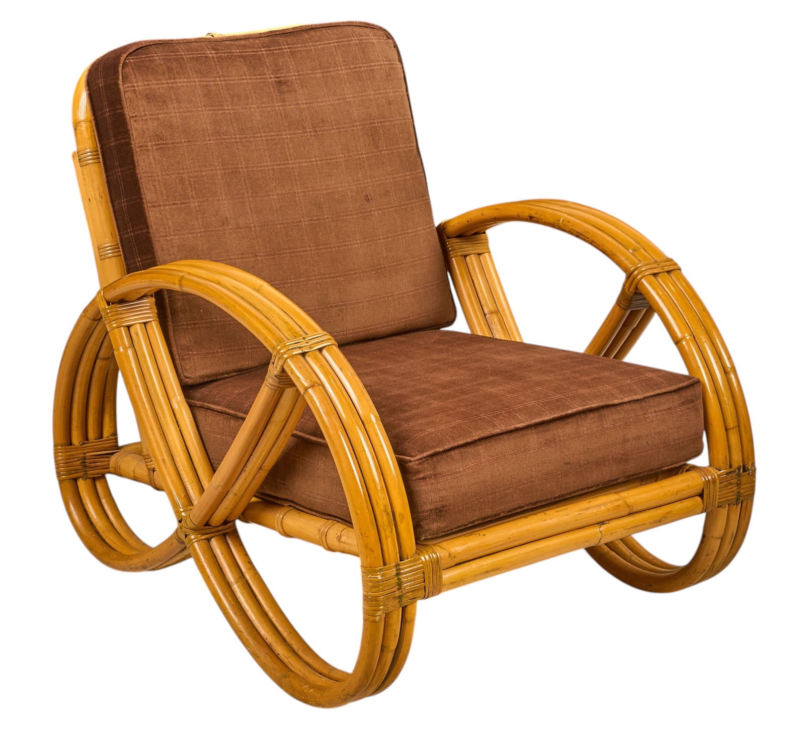 Vintage Rattan Lounge Chair: Vintage bent rattan lounge chair, with removable upholstered cushions in brown fabricheight 30 in. x width 29 in. x depth 33 in.Provenance: Property from a home in San Antonio, Texas