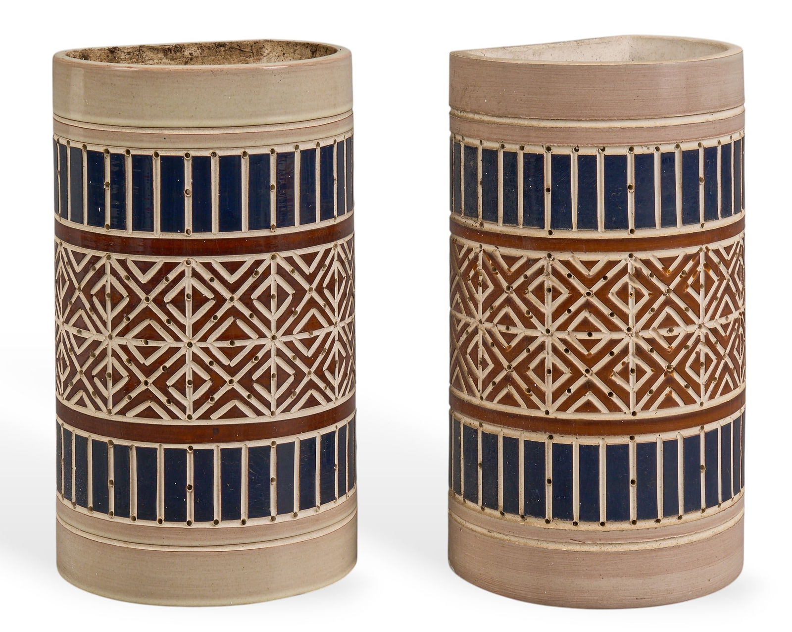 Pair of Beaumont Mood Sconces: Pair of Beaumont Mood (San Antonio, Texas) ceramic wall sconces, with geometric patterns in brown, blue, and beige tones and perforated accents, polychrome glaze height 12.5 in. x widt