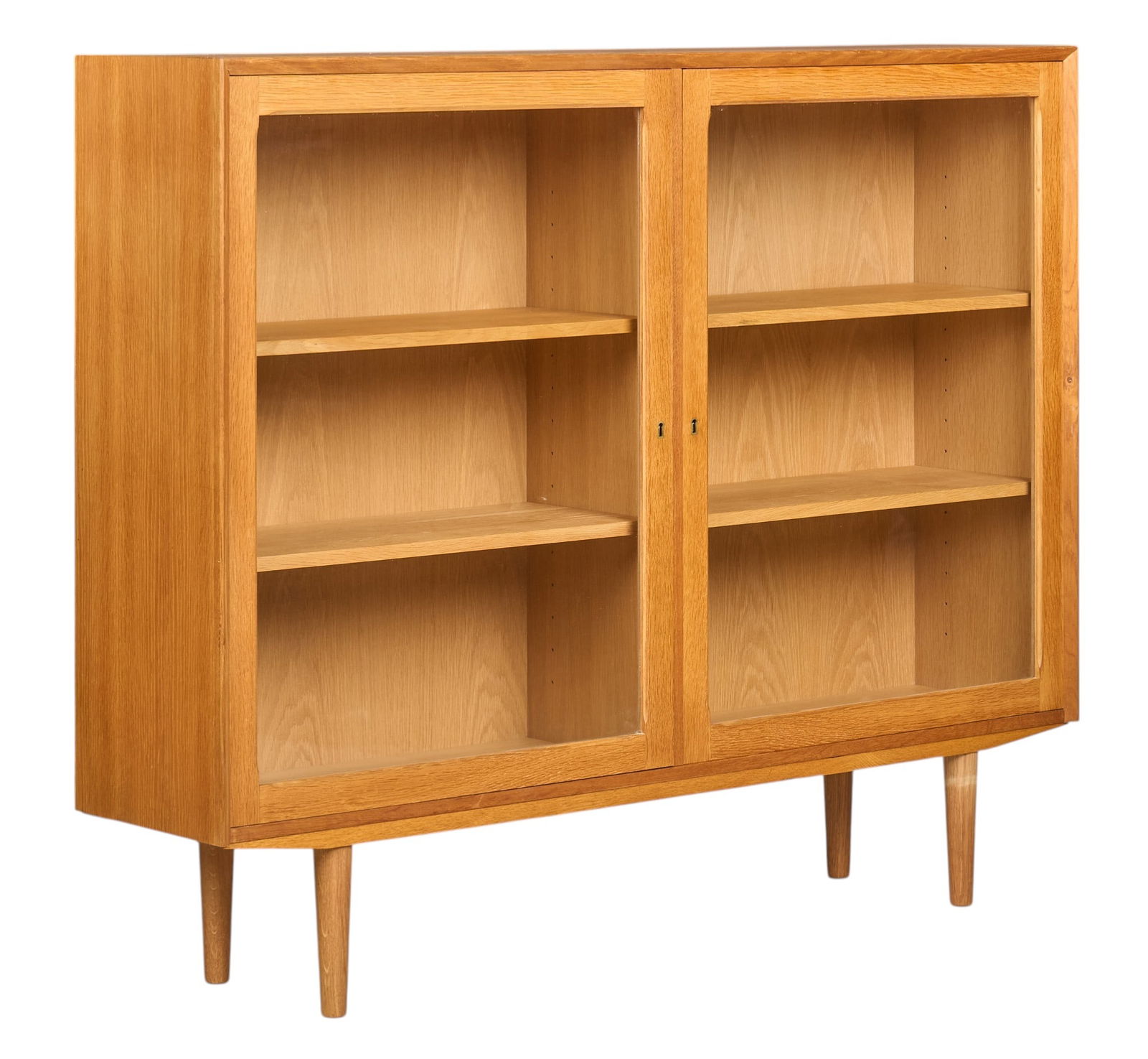 Brouer Mid-Century Glass-Front Cabinet: Brouer (Denmark) mid-century cabinet with pair of glass-front doors, and three adjustable shelves, supported on pin legs, marked on back height 43.5 in. x width 53.5 in. x depth 12 in. 