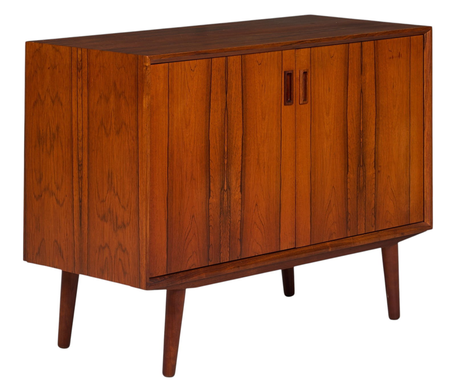 Danish Mid-Century Credenza: Danish mid-century credenza with pair of cabinet doors opening to interior with single adjustable shelf, supported on pin legs height 29 in. x width 39.5 in. x depth 17 in. 