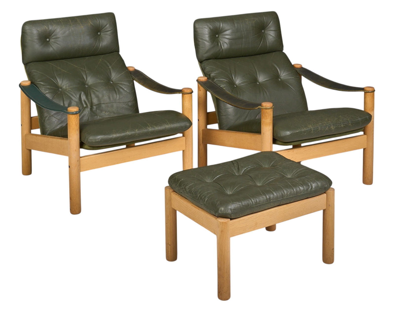 Danish Mid-Century Lounge Chair Set: Danish mid-century lounge chair set with pair of matching chairs with green leather strap armrests, green leather cushions, and one matching ottoman height 31 in. x width 28 in. x depth 31 in. /