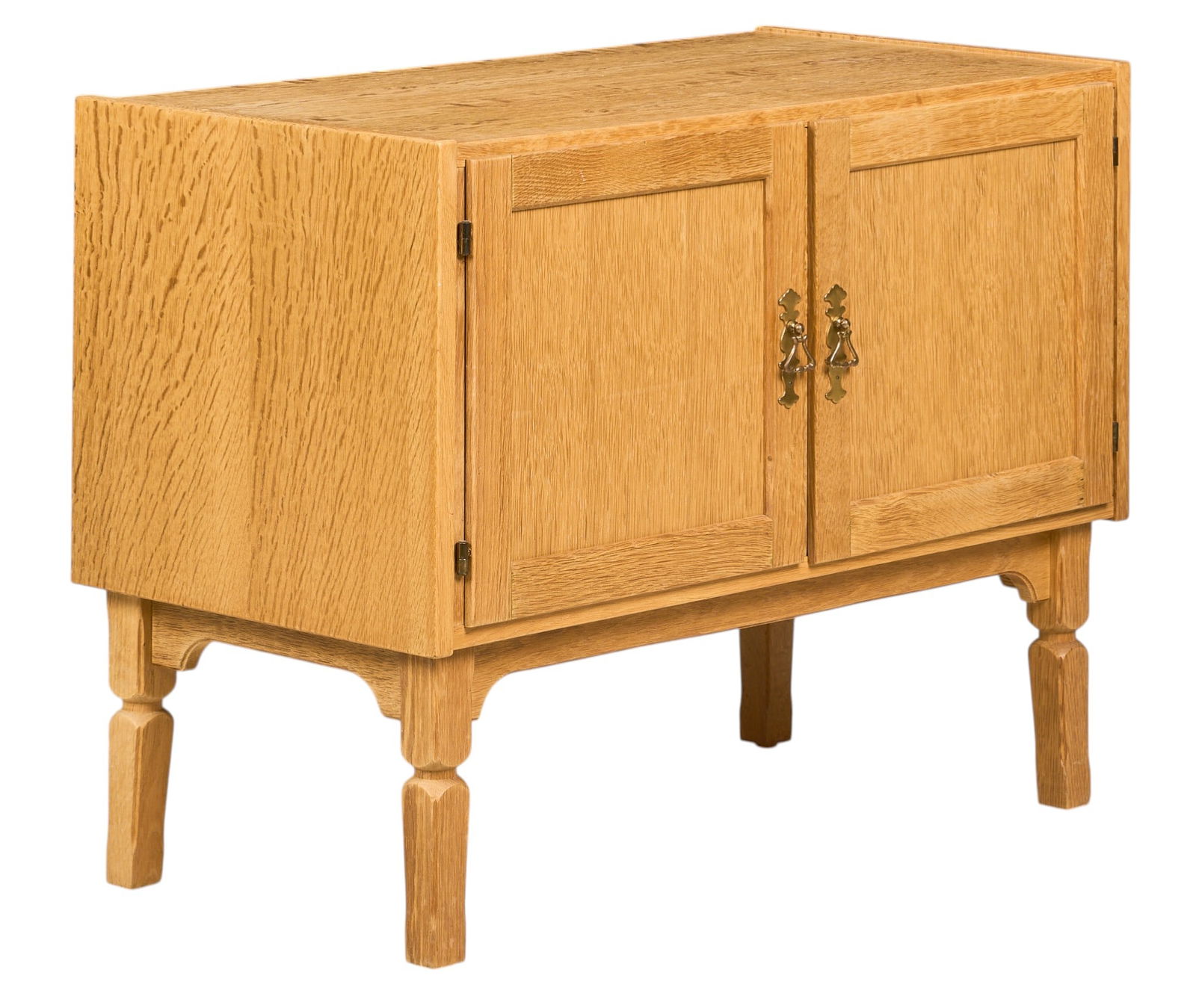 Henning Kjaernulf, Mid-Century Cabinet: Henning Kjaernulf (Denmark) oak mid-century cabinet with single shelf, supported on sculpted block legsheight 25.5 in. x width 33 in. x depth 17 in. 