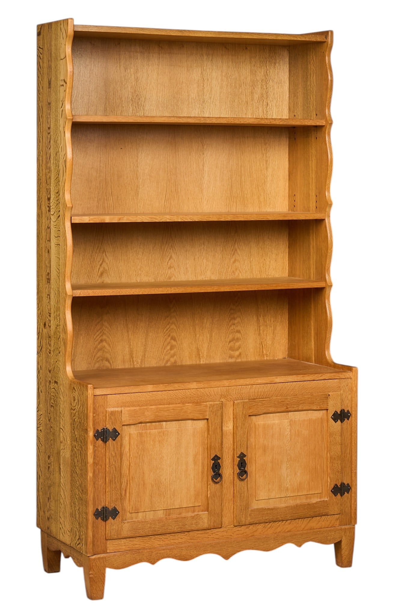 Danish Mid-Century Bookcase: Danish mid-century bookcase with three shelves and bottom cabinet with iron hardware, and single interior shelf, supported on block legsheight 72.5 in. x width 39.5 in. x depth 17.5 in. 