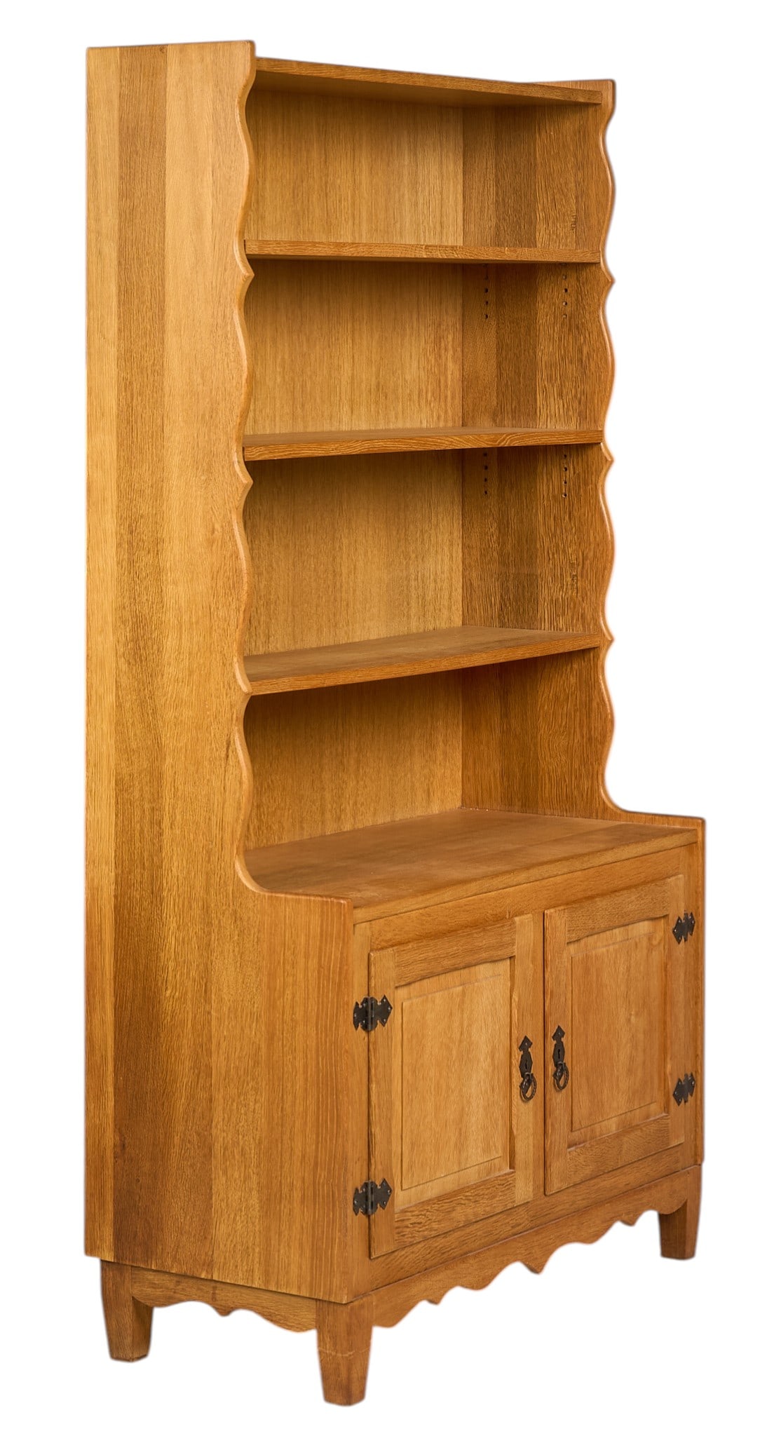 Danish Mid-Century Bookcase: Danish mid-century bookcase with three shelves and lower cabinet, supported on block legsheight 72.5 in. x width 39.5 in. x depth 17.5 in. 