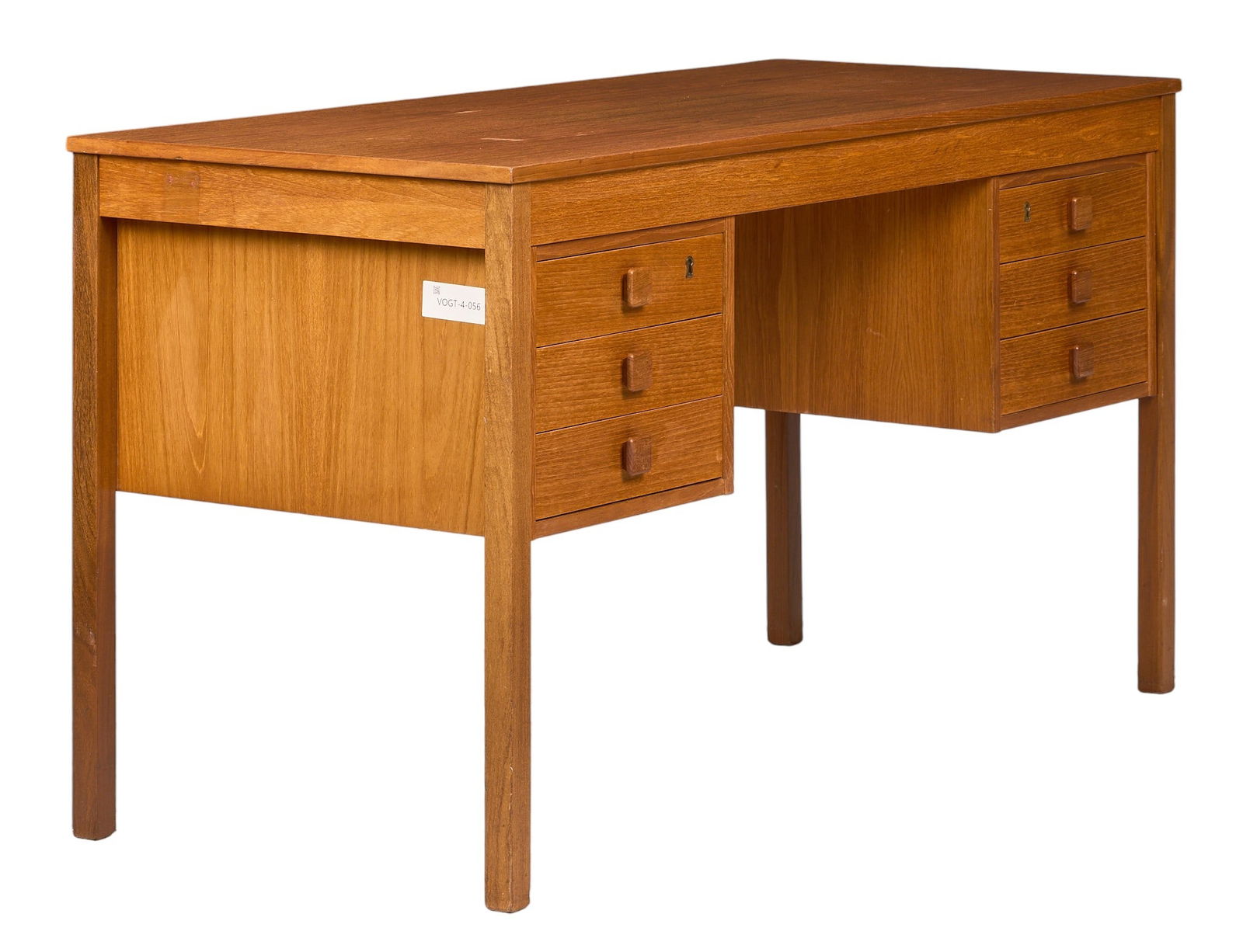 Danish Mid-Century Desk: Danish mid-century desk with six drawers, supported on block legsheight 29.5 in. width 53 in. x depth 23.5 in. 