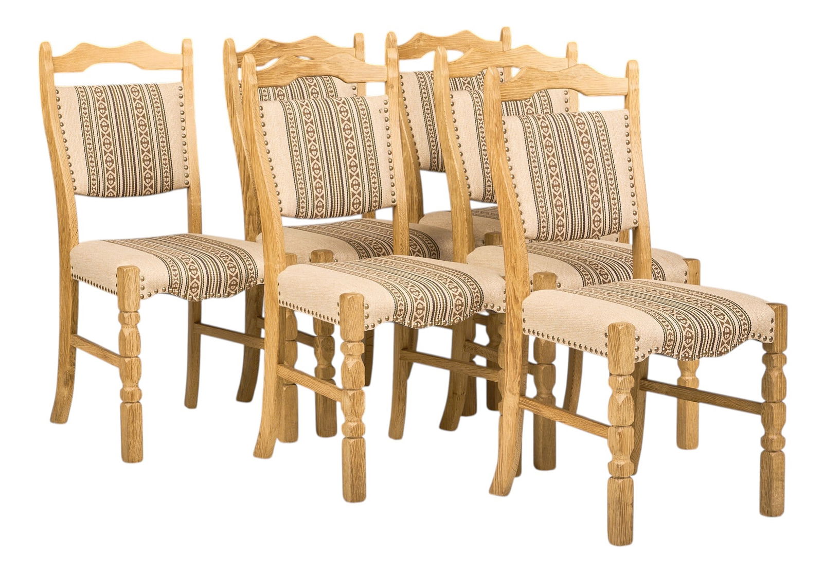 Set of (6) Henning Kjaernulf Mid-Century Dining Chairs: Set of six Henning Kjaernulf (Denmark) dining chairs with oak frames, and patterned fabric upholstery with metal nailhead trim, supported on sculpted block legs height 38 in. x width 18 in. x depth 17
