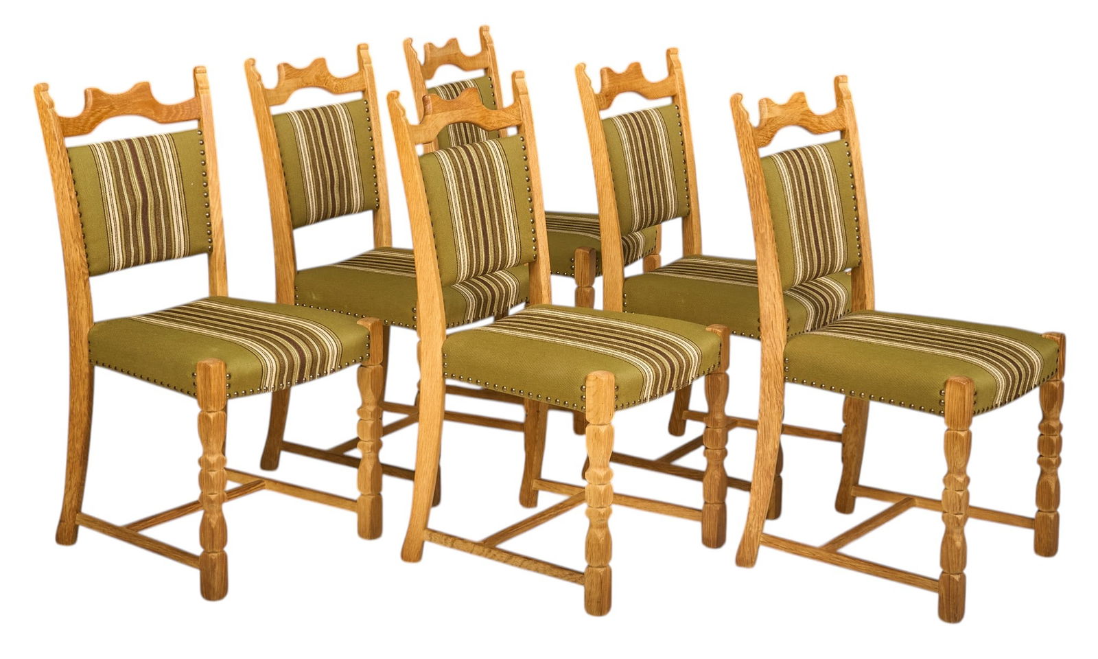 Set of (6) Henning Kjaernulf Mid-Century Dining Chairs: Set of six Henning Kjaernulf (Denmark) oak dining chairs with curved back frame, sculptured block legs, and striped upholstery with iron nailhead trim height 36 in. x width 18 in x depth 19 in. /