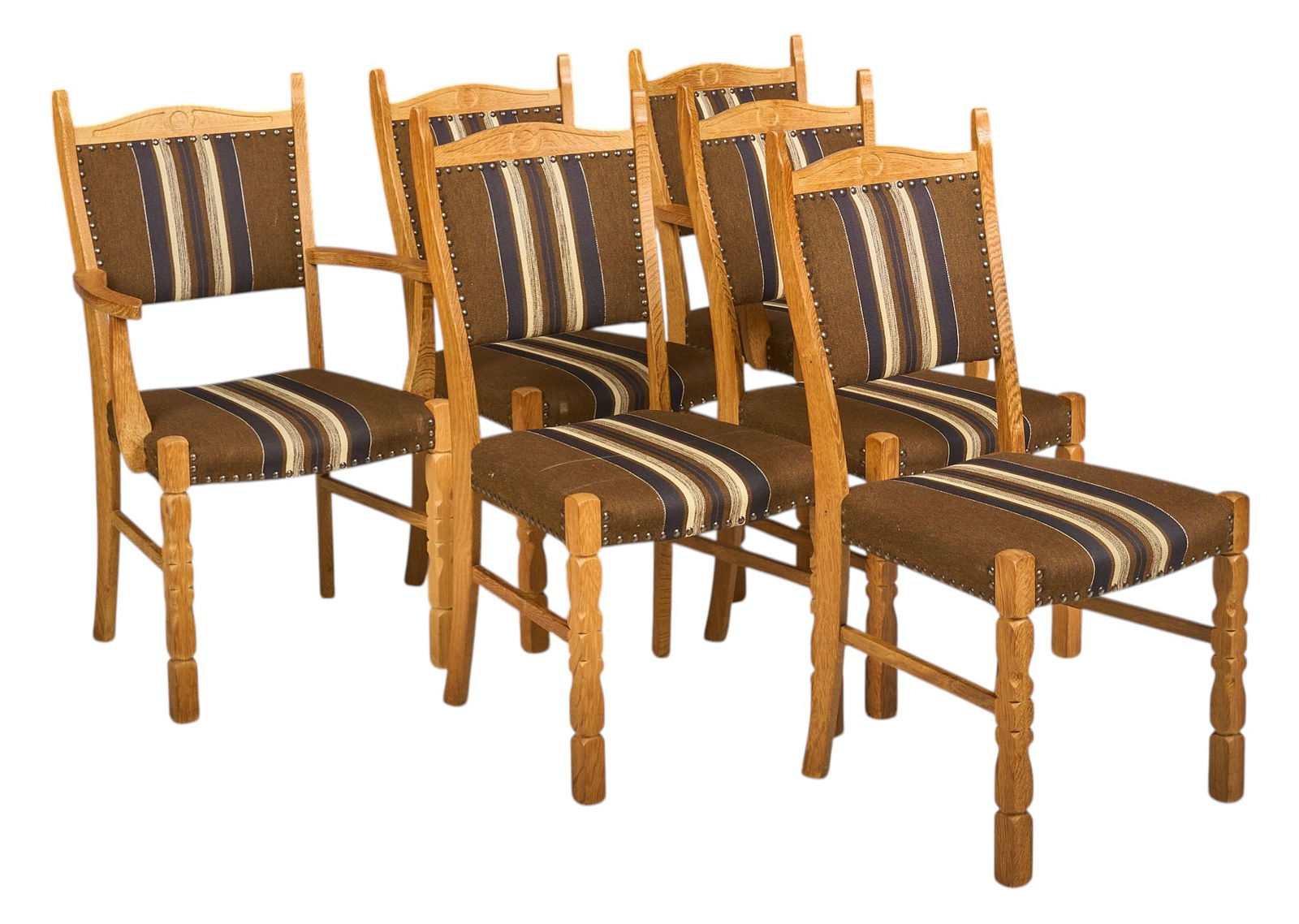 Set of (6) Henning Kjaernulf Mid-Century Dining Chairs: Set of six Henning Kjaernulf (Denmark) oak dining chairs with brown, black and white striped upholstery with iron nailhead trim, supported on sculpted block legs height 38 in. x width 19 in x depth 24