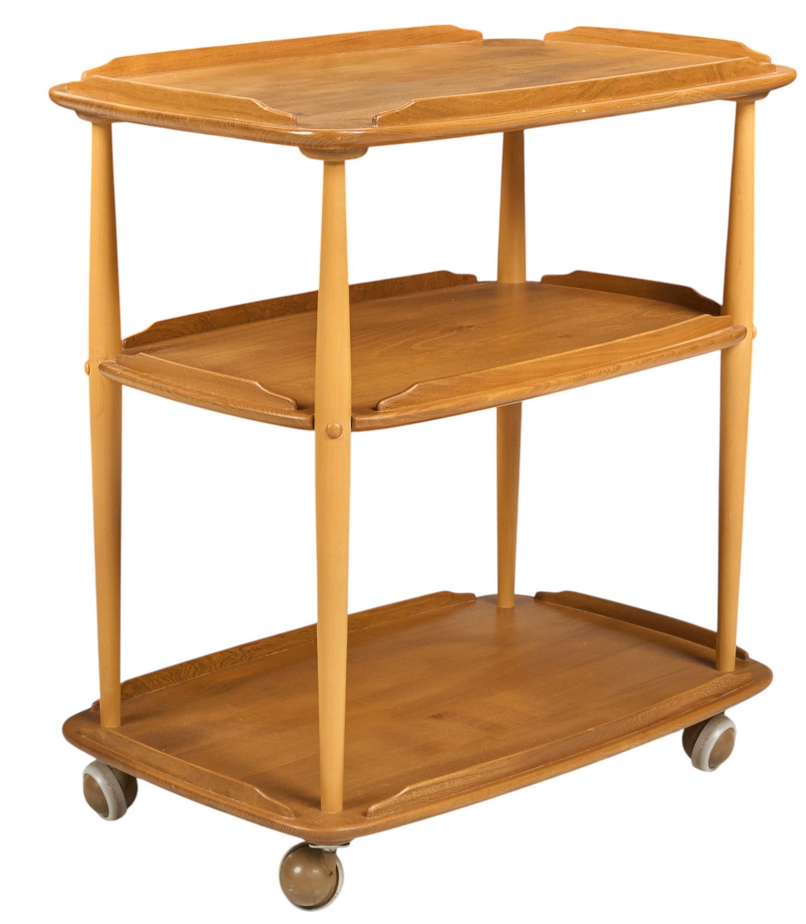 Ercol English Mid-Century Three-Tier Trolley: Ercol English mid-century elm wood serving trolley with three tiers, supported on wheels, marked with Ercol sticker, circa 1950s-1960sheight 30 in. x width 28 in. x depth 18 in. Provenance: