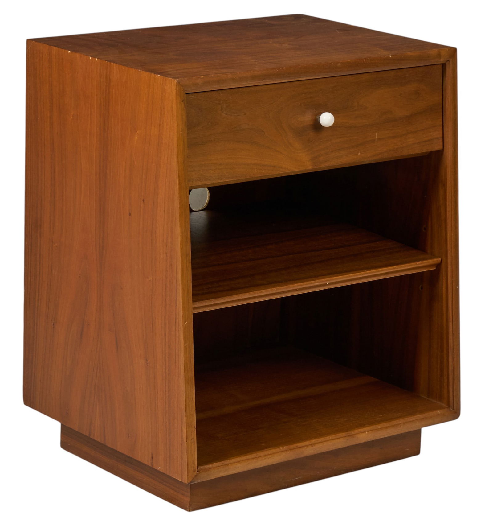 Drexel Walnut Nightstand: Walnut nightstand from Drexel's "Declaration" line, featuring a single drawer with round white knob, two open shelves, and a recessed base, marked to reverse, circa 1965 height 24 i
