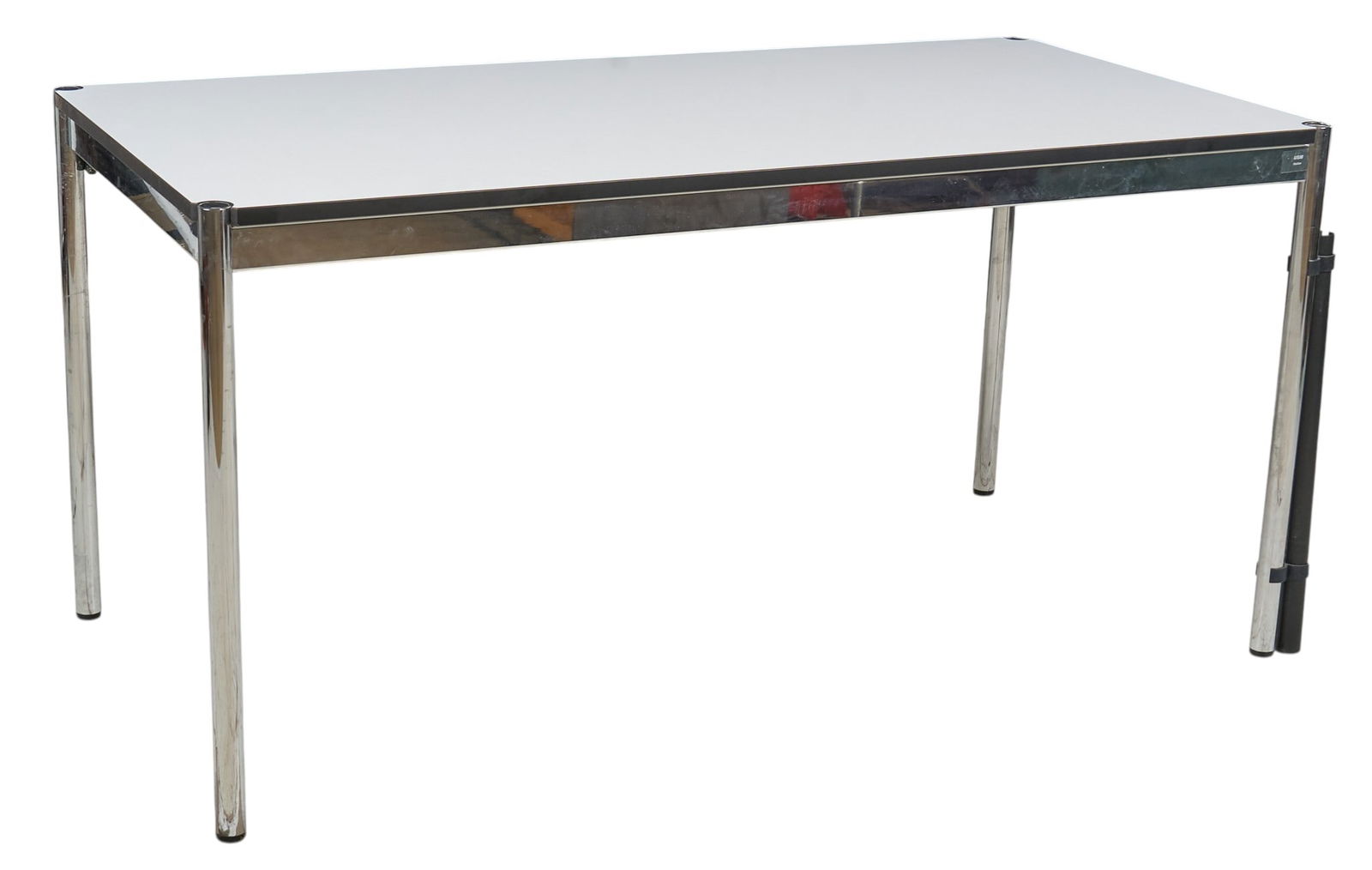 USM Haller Table: Haller rectangular table by Fritz Haller for USM Modular, with chrome frame and table legs, and pearl gray white laminate topheight 29 in. x width 56 in. x depth 30 in. Provenance: